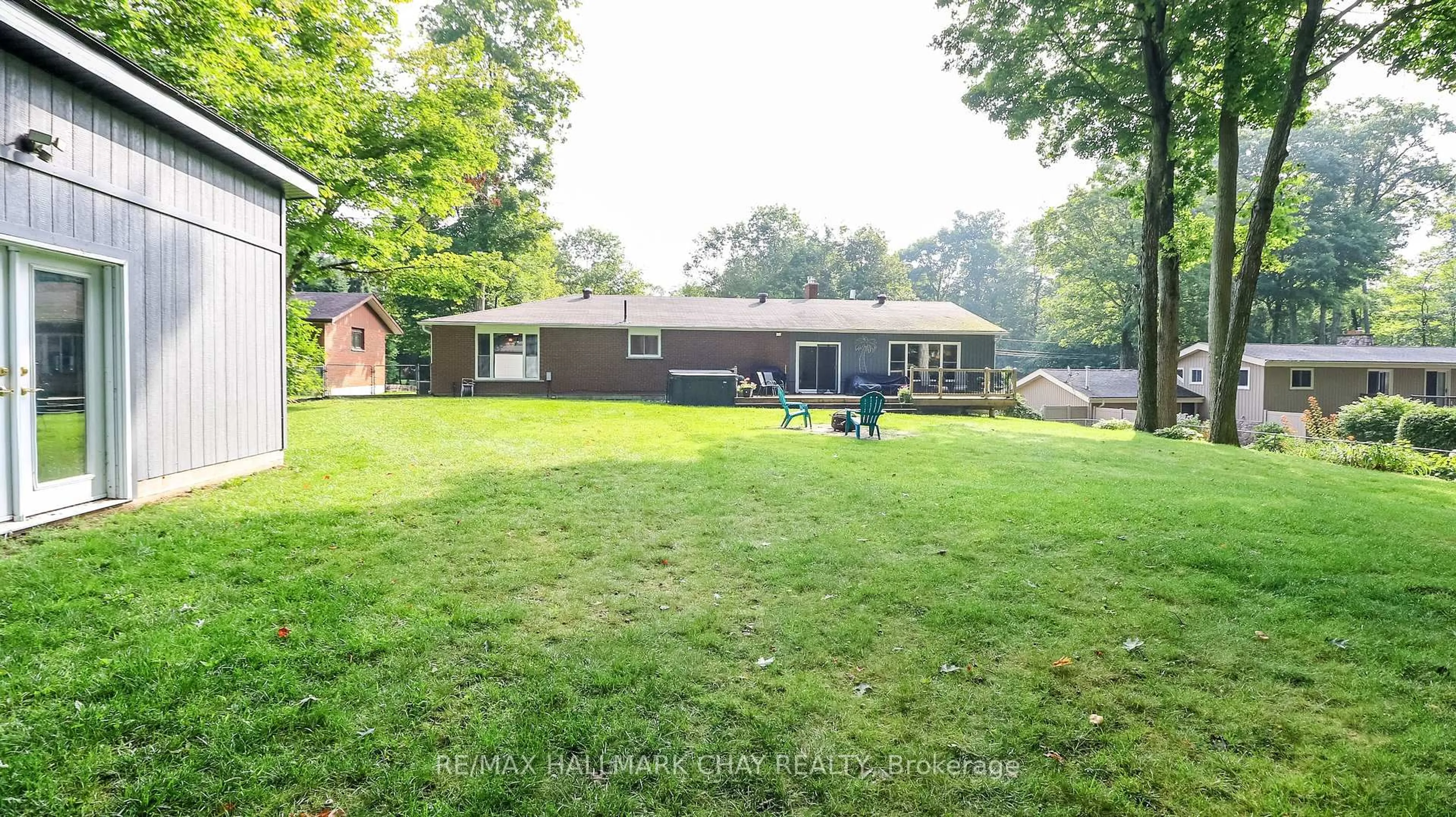 A pic from outside/outdoor area/front of a property/back of a property/a pic from drone, water/lake/river/ocean view for 10 Enchantment Ave, Tiny Ontario L9M 0H5
