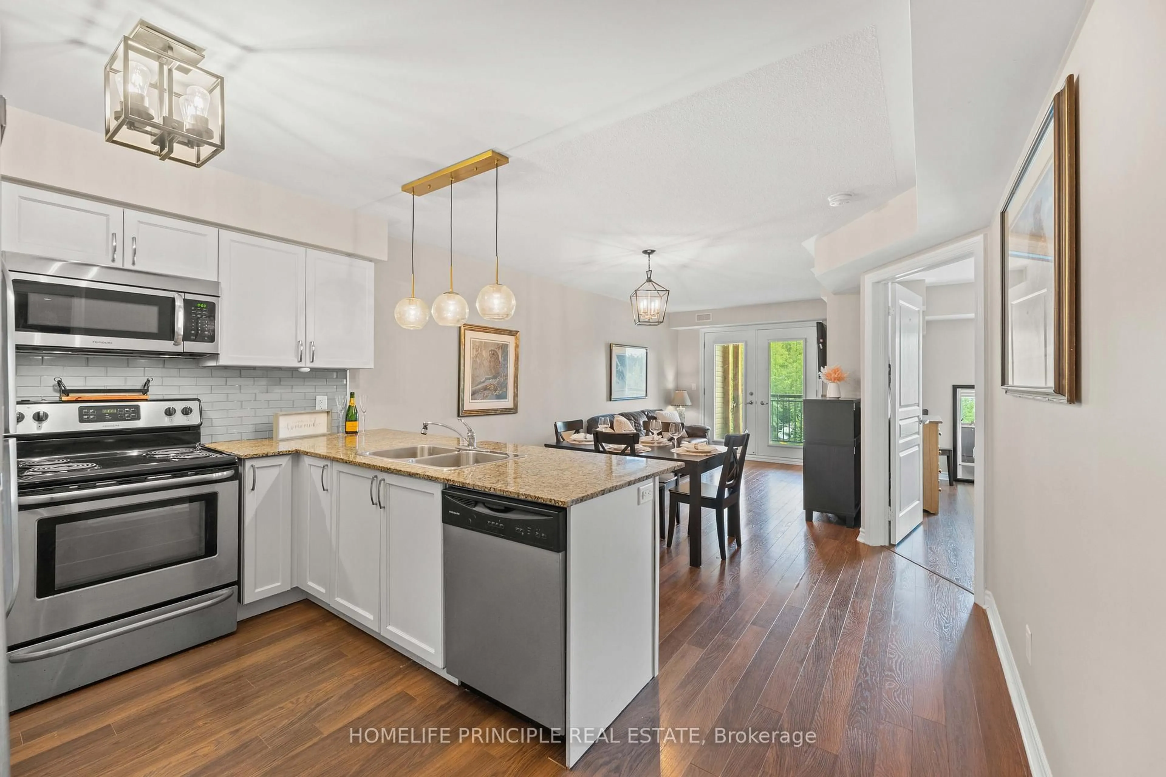 Open concept kitchen, unknown for 3 Brandy Lane Dr #205, Collingwood Ontario L9Y 0X4