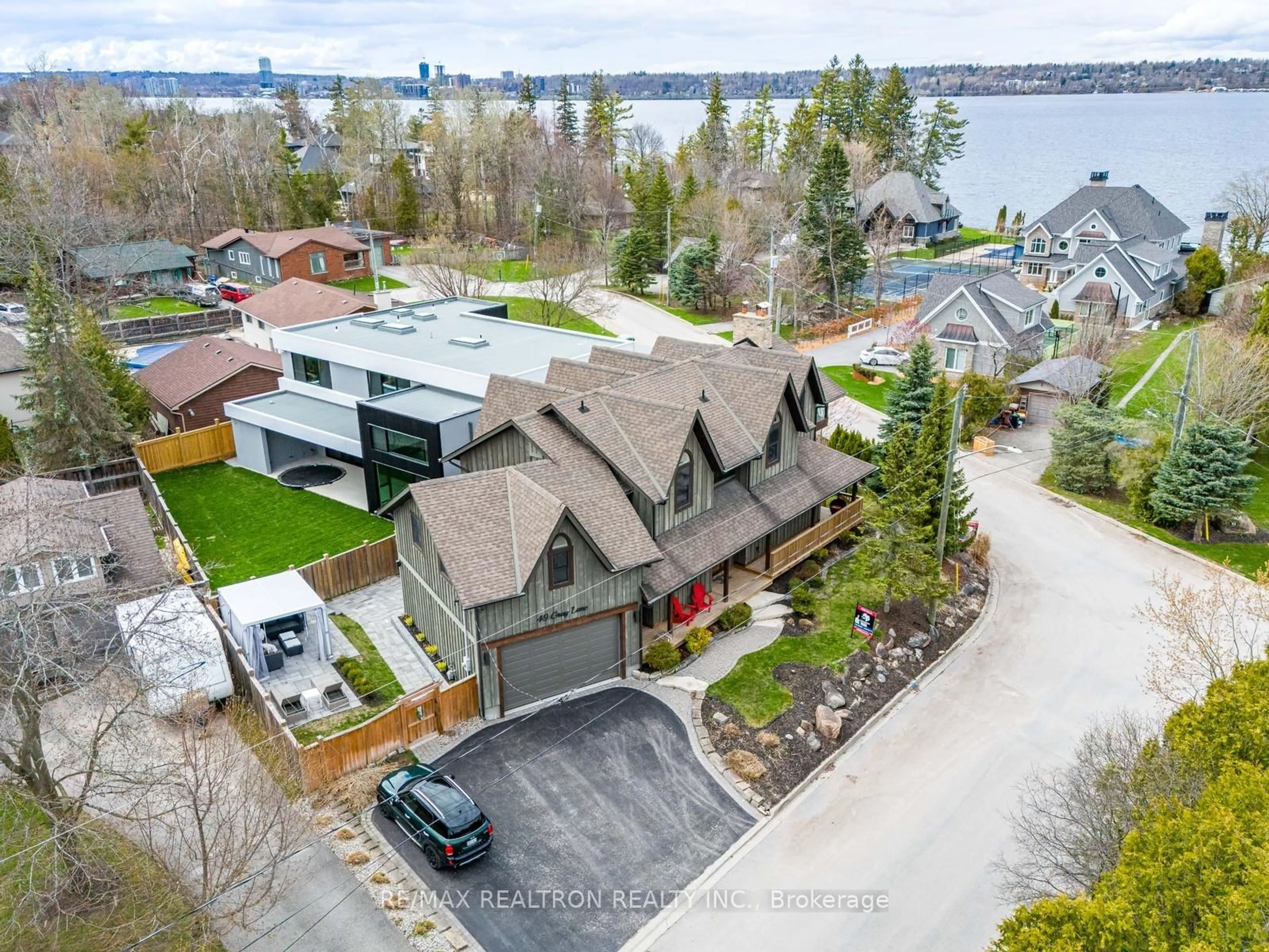 A pic from outside/outdoor area/front of a property/back of a property/a pic from drone, water/lake/river/ocean view for 49 Gray Lane, Barrie Ontario L4N 7T1
