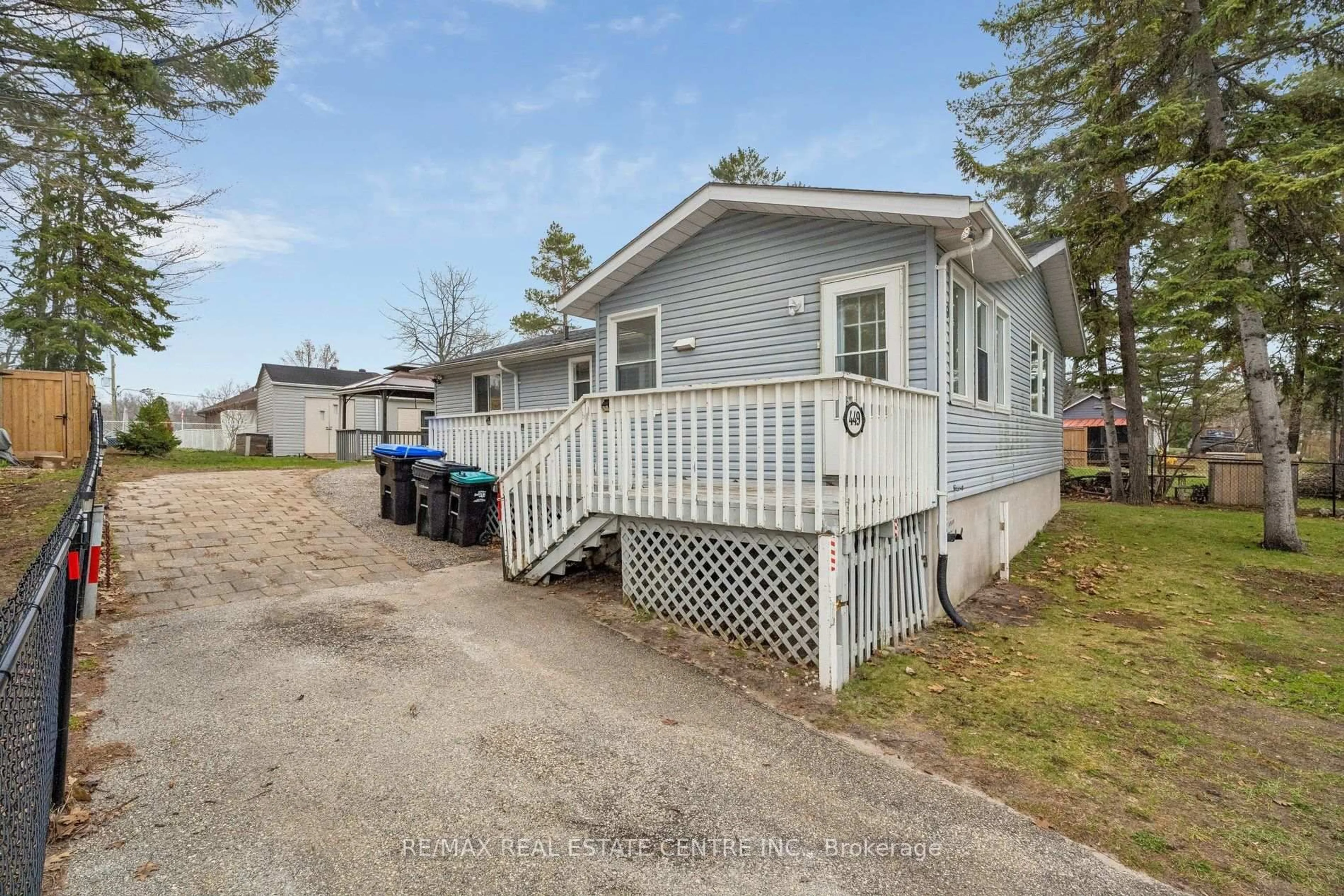 Home with vinyl exterior material, street for 449 Mosley St, Wasaga Beach Ontario L9Z 2J4