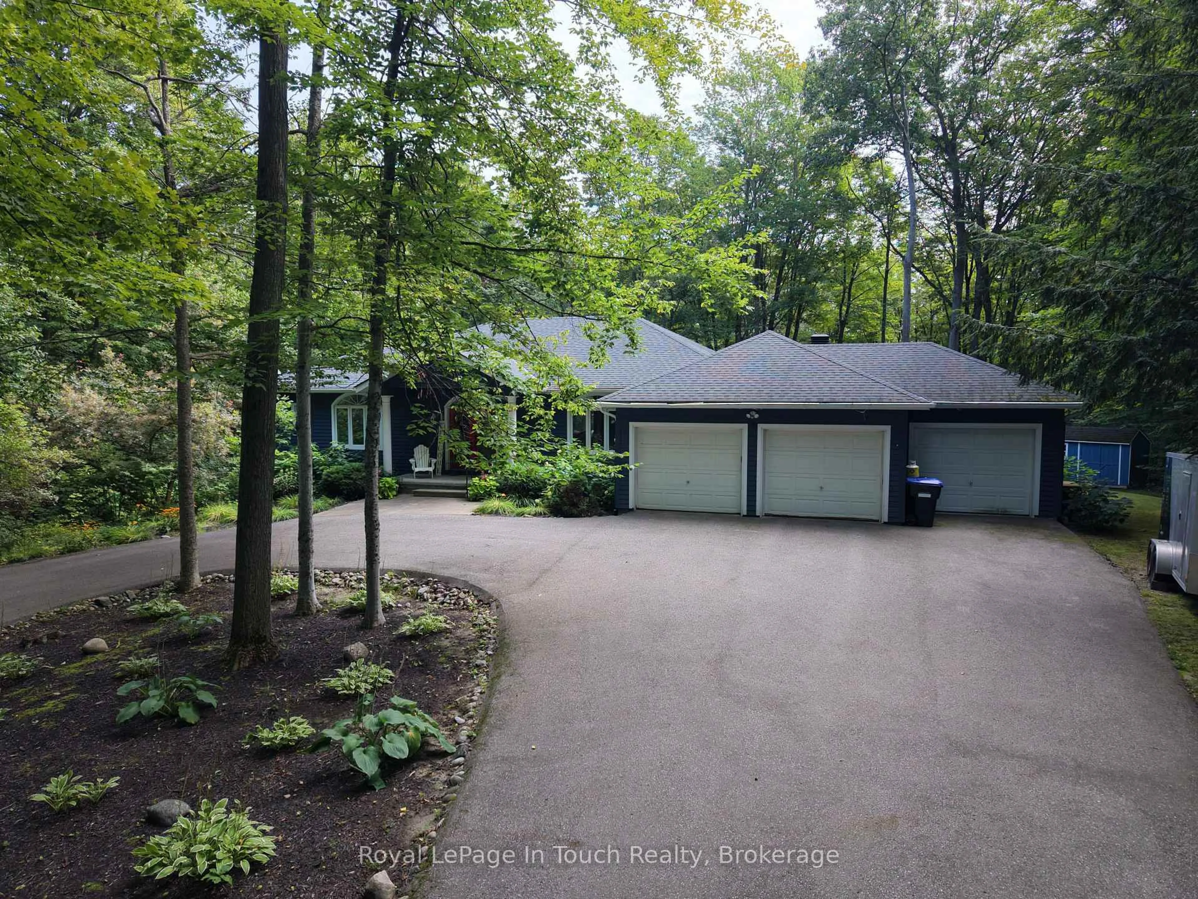 A pic from outside/outdoor area/front of a property/back of a property/a pic from drone, forest/trees view for 106 Copeland Creek Dr, Tiny Ontario L9M 0M2