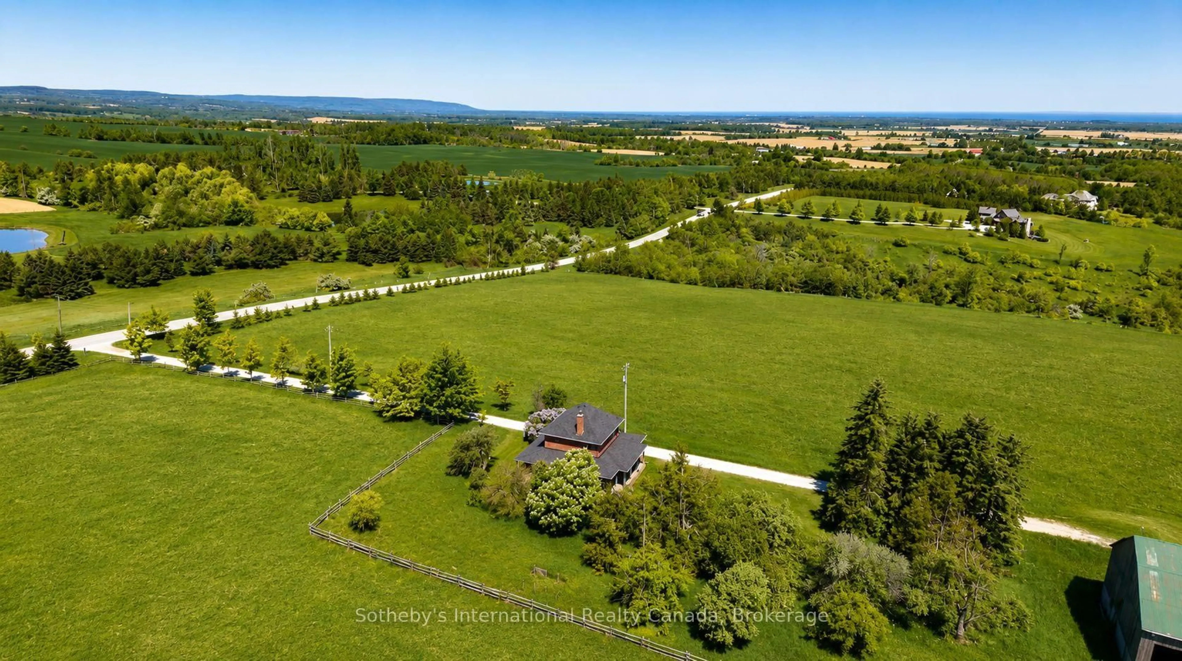 A pic from outside/outdoor area/front of a property/back of a property/a pic from drone, water/lake/river/ocean view for 1943 Fairgrounds Rd, Clearview Ontario L0M 1G0