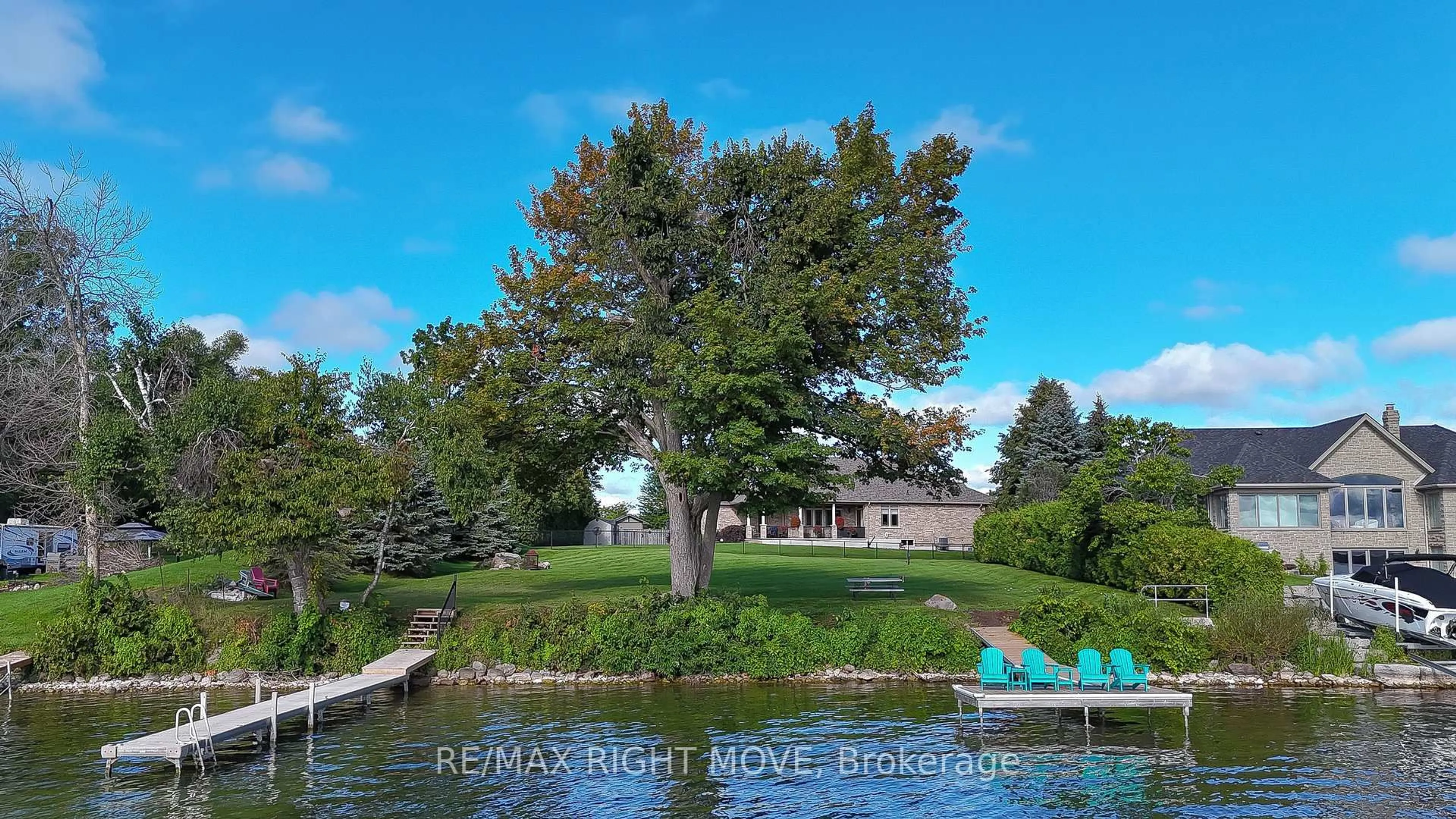 A pic from outside/outdoor area/front of a property/back of a property/a pic from drone, water/lake/river/ocean view for 3938 Wood Ave, Severn Ontario L3V 0Y9