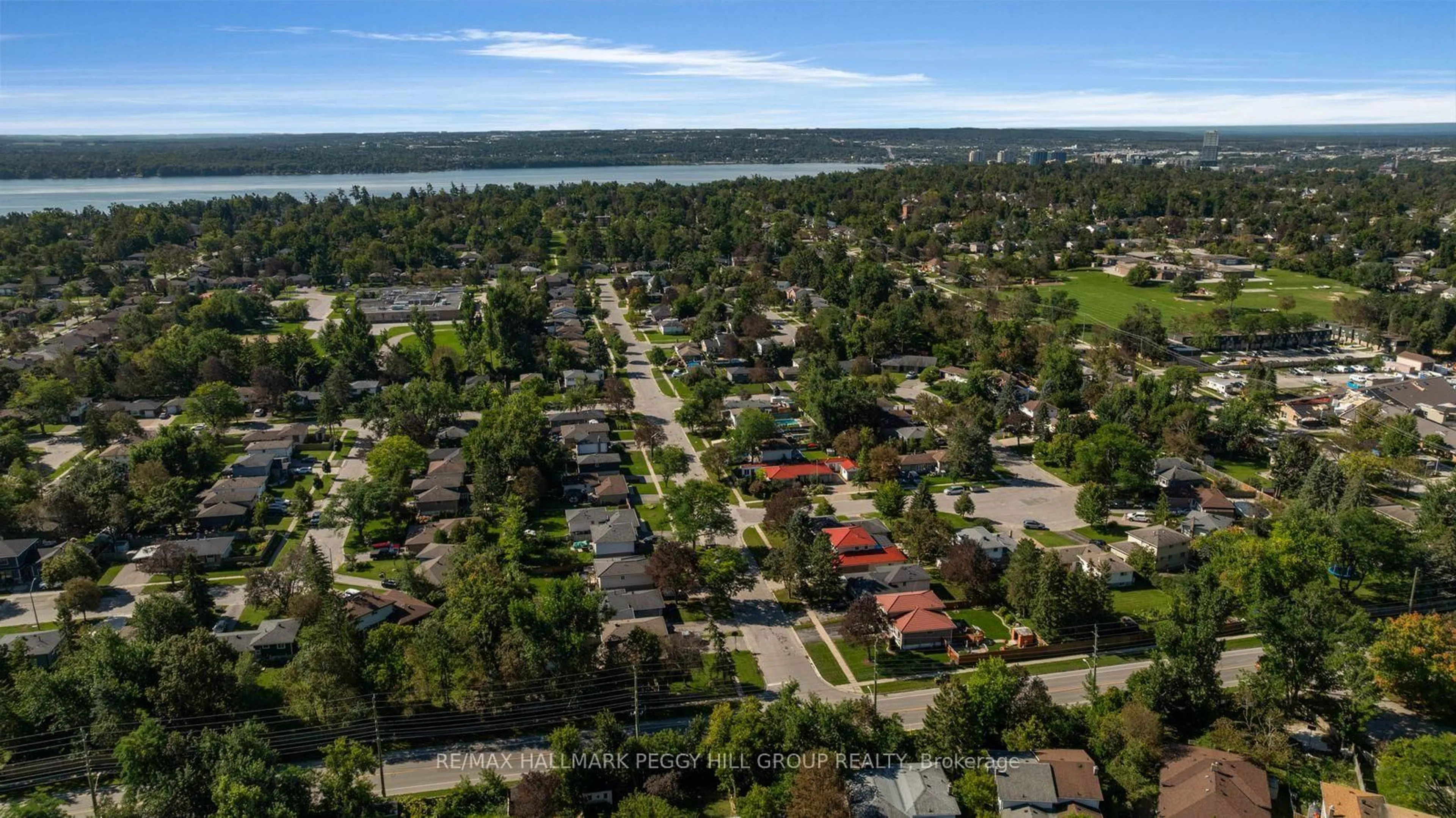 A pic from outside/outdoor area/front of a property/back of a property/a pic from drone, water/lake/river/ocean view for 46 College Cres, Barrie Ontario L4M 2W3