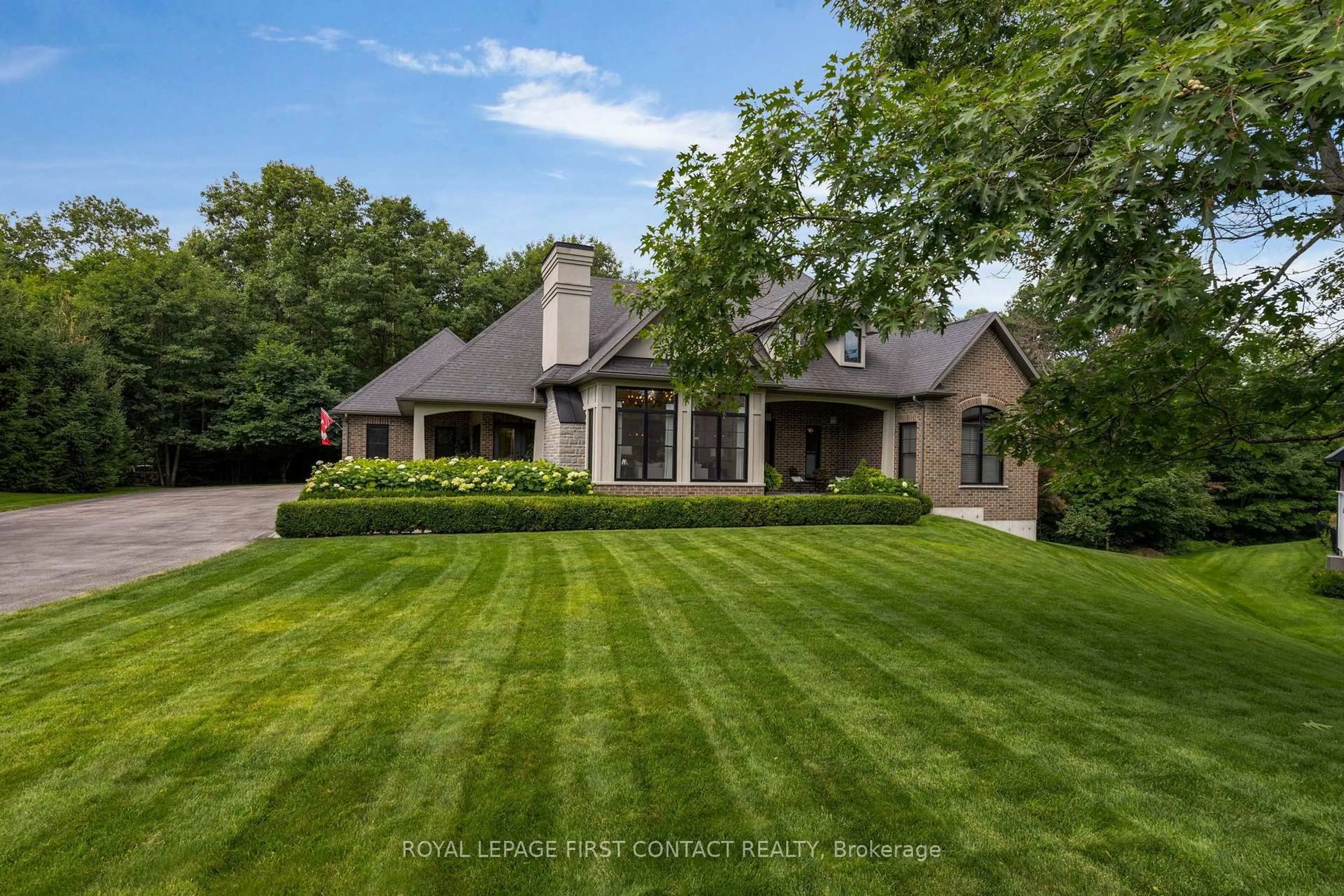 A pic from outside/outdoor area/front of a property/back of a property/a pic from drone, street for 49 Black Creek Tr, Springwater Ontario L9X 0J2