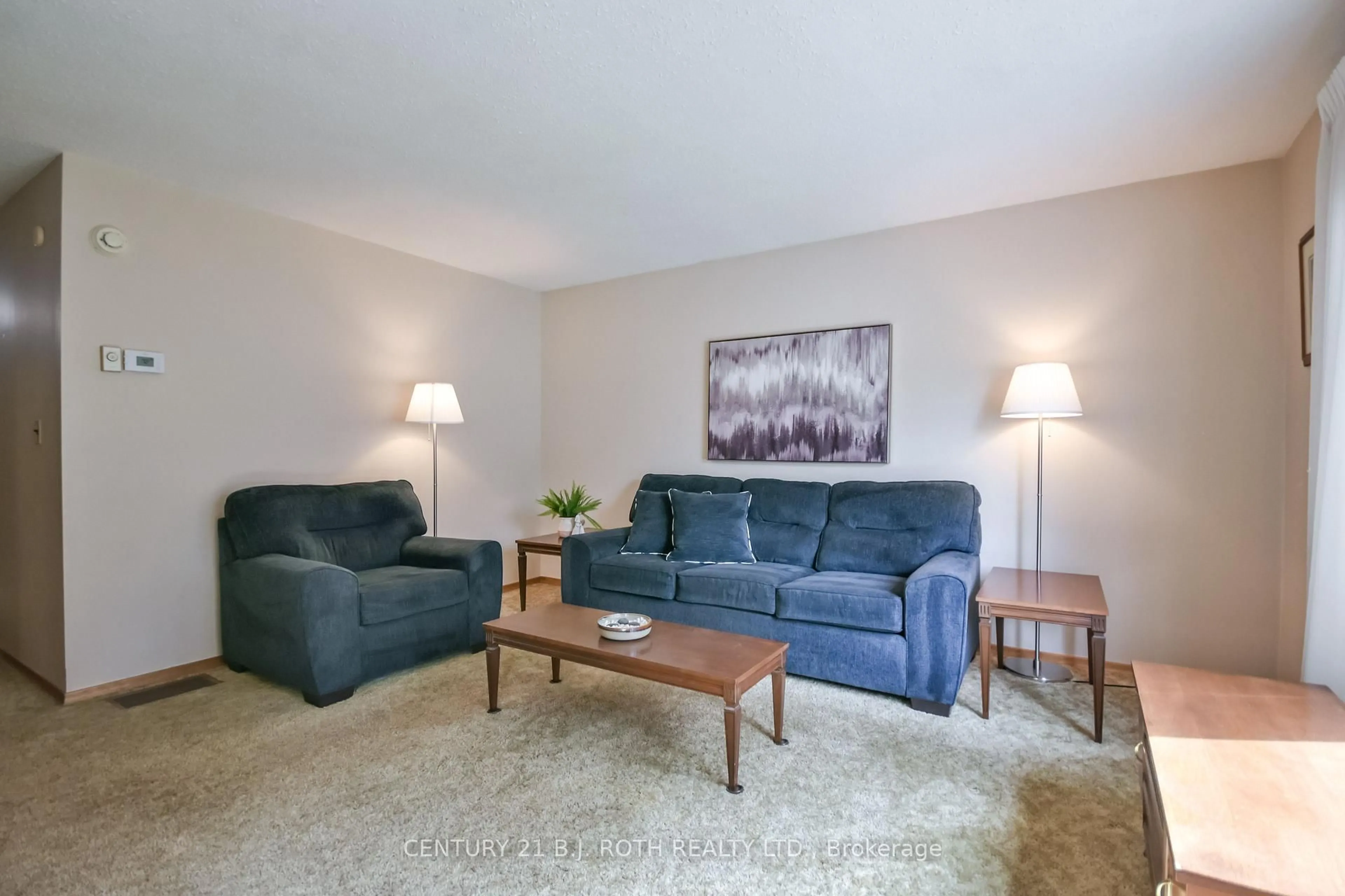 Living room with furniture, carpet floor for 380 Mary St, Orillia Ontario L3V 3G3