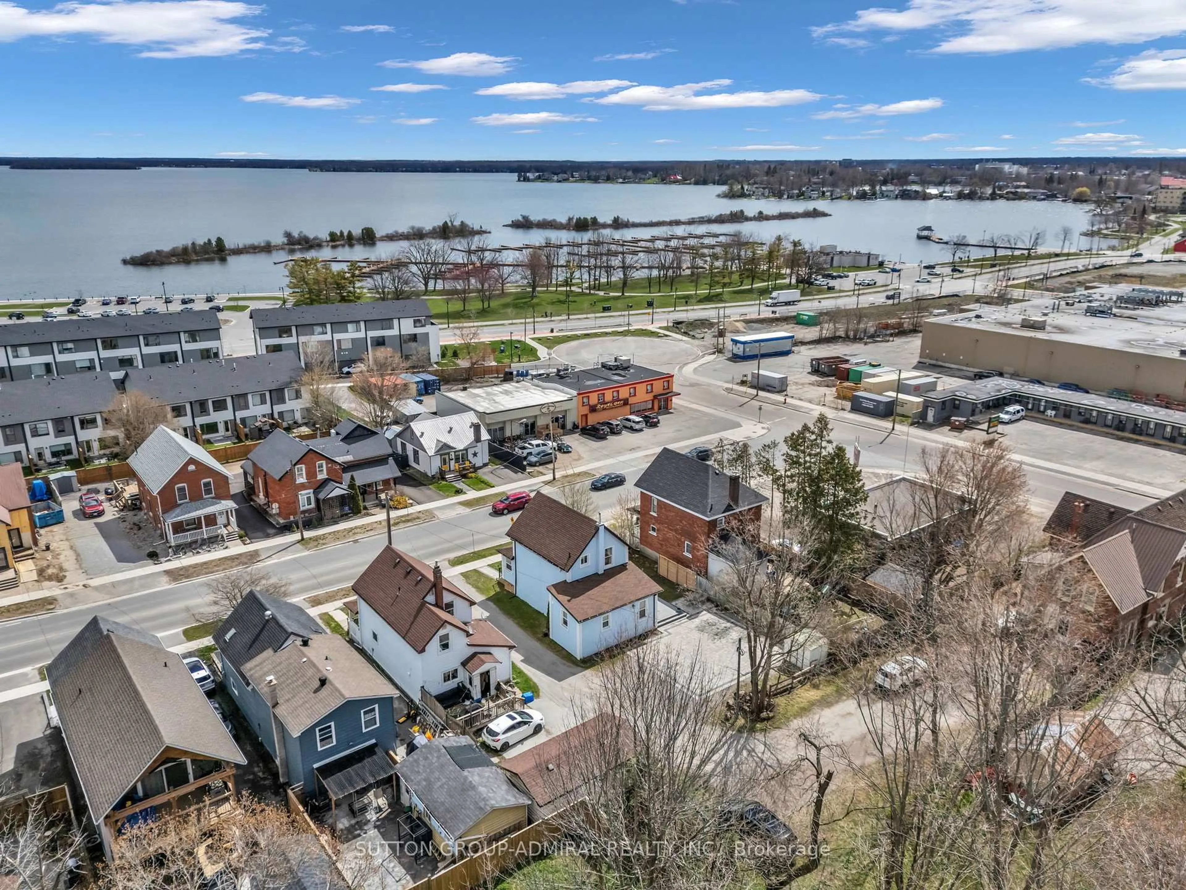 A pic from outside/outdoor area/front of a property/back of a property/a pic from drone, water/lake/river/ocean view for 97 Laclie St, Orillia Ontario L3V 4W9