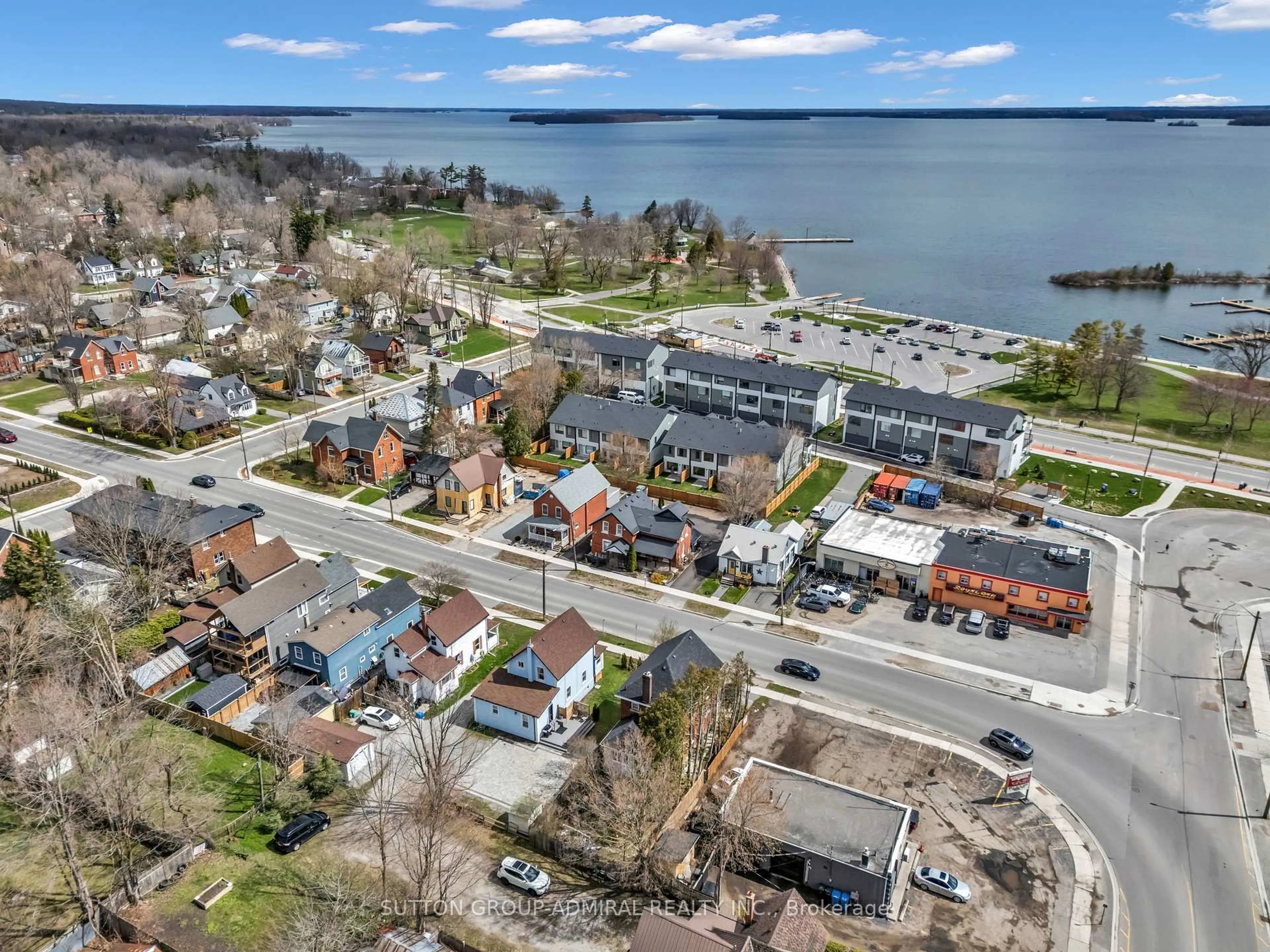 A pic from outside/outdoor area/front of a property/back of a property/a pic from drone, water/lake/river/ocean view for 97 Laclie St, Orillia Ontario L3V 4W9