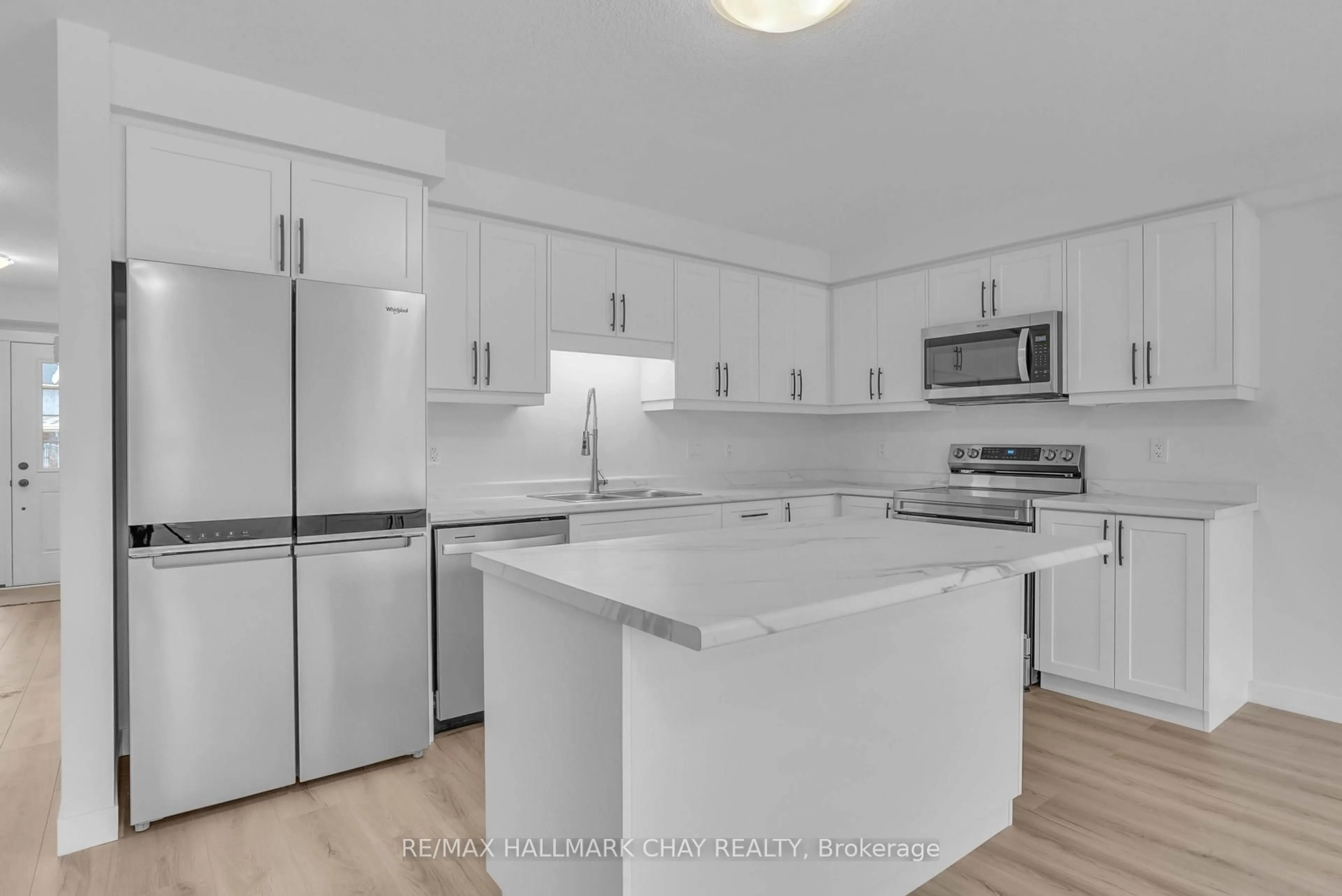 Open concept kitchen, unknown for 36 Strath Cres, Springwater Ontario L0L 1P0