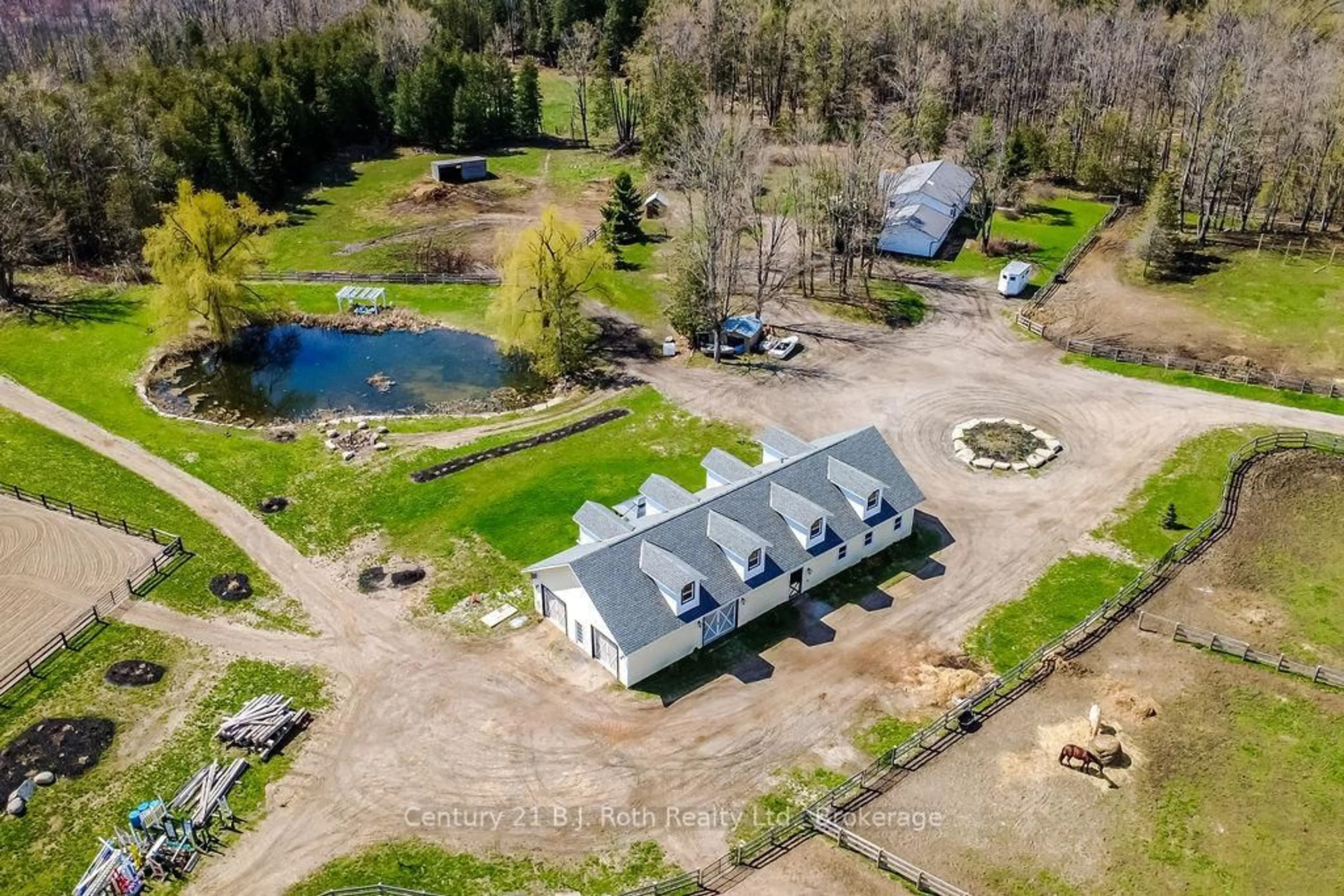 A pic from outside/outdoor area/front of a property/back of a property/a pic from drone, water/lake/river/ocean view for 465 Ridge Rd, Oro-Medonte Ontario L0L 2E0
