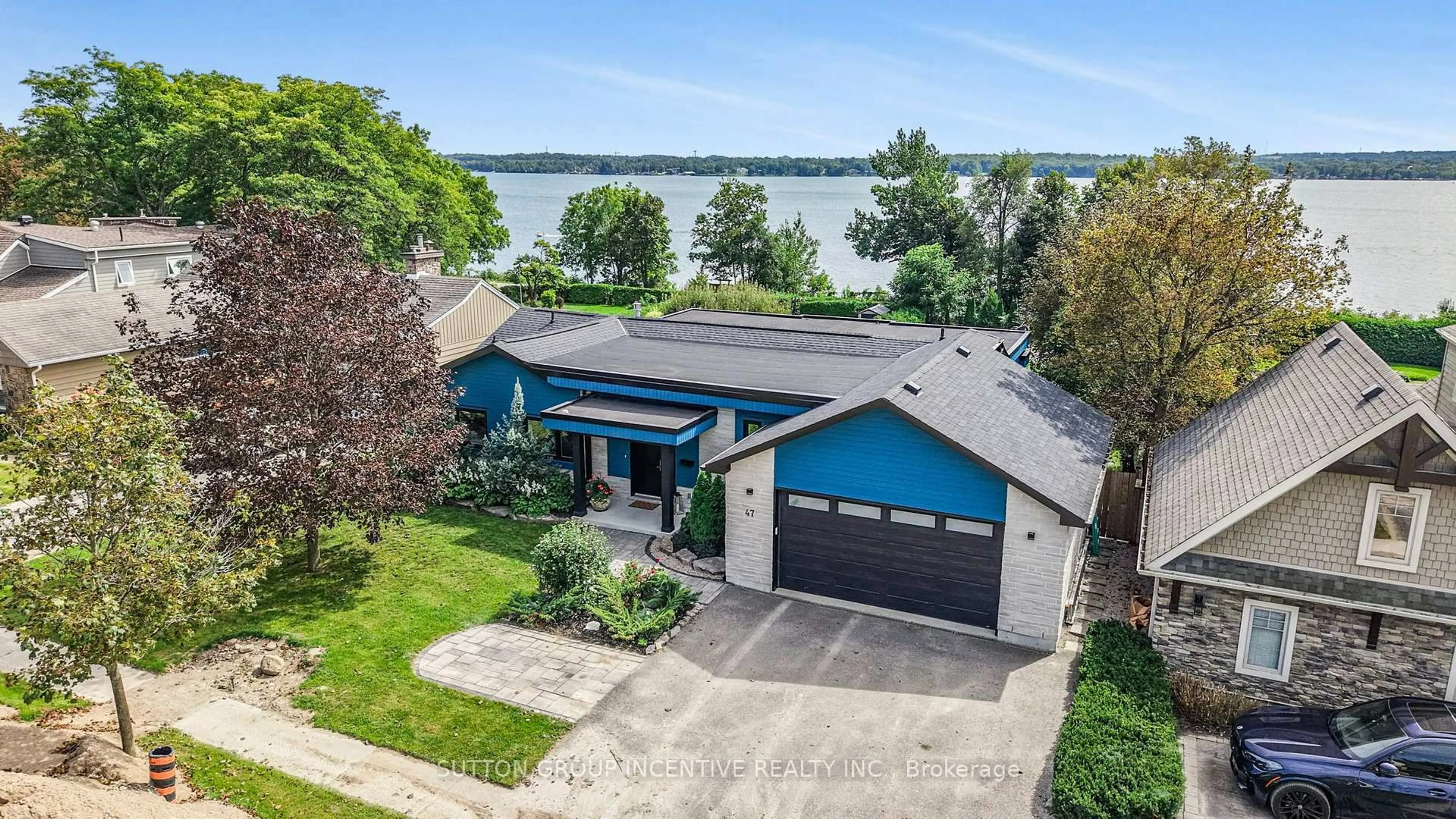 A pic from outside/outdoor area/front of a property/back of a property/a pic from drone, water/lake/river/ocean view for 47 Shanty Bay Rd, Barrie Ontario L4M 1C9