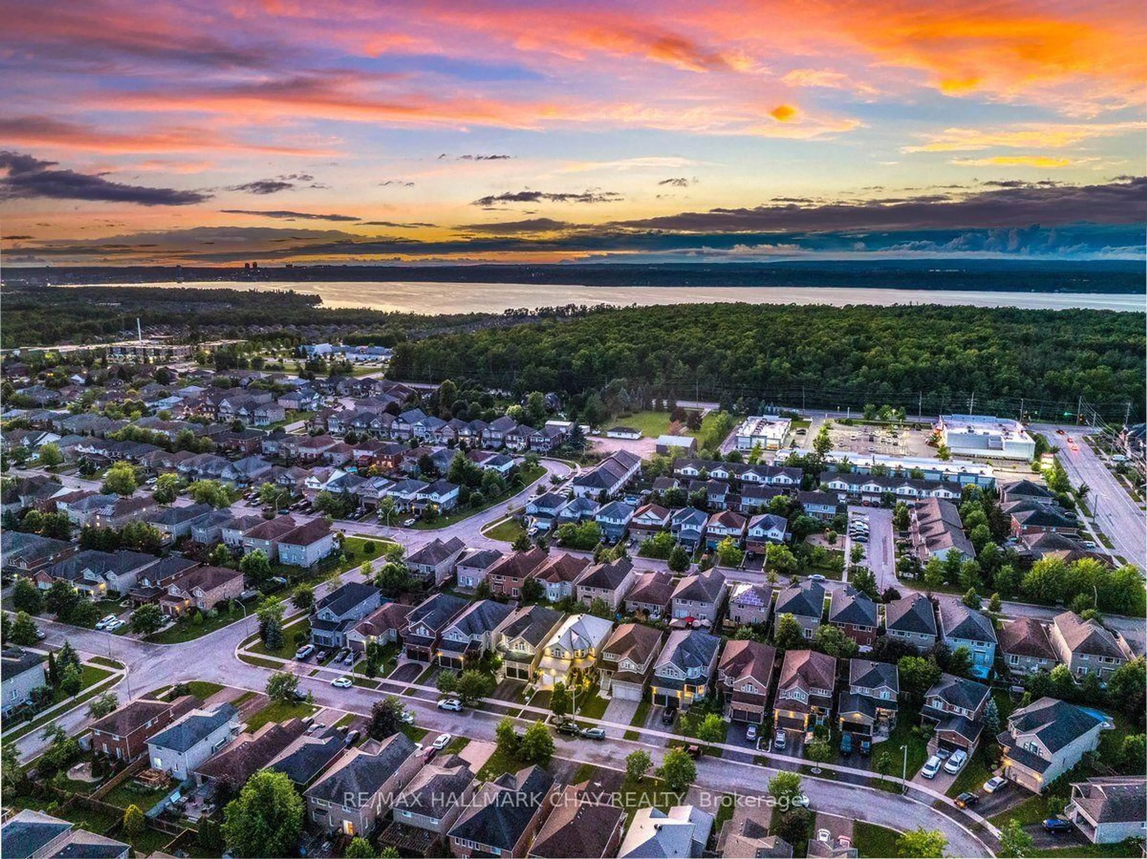 A pic from outside/outdoor area/front of a property/back of a property/a pic from drone, water/lake/river/ocean view for 12 Parisian Cres, Barrie Ontario L4N 0Y9