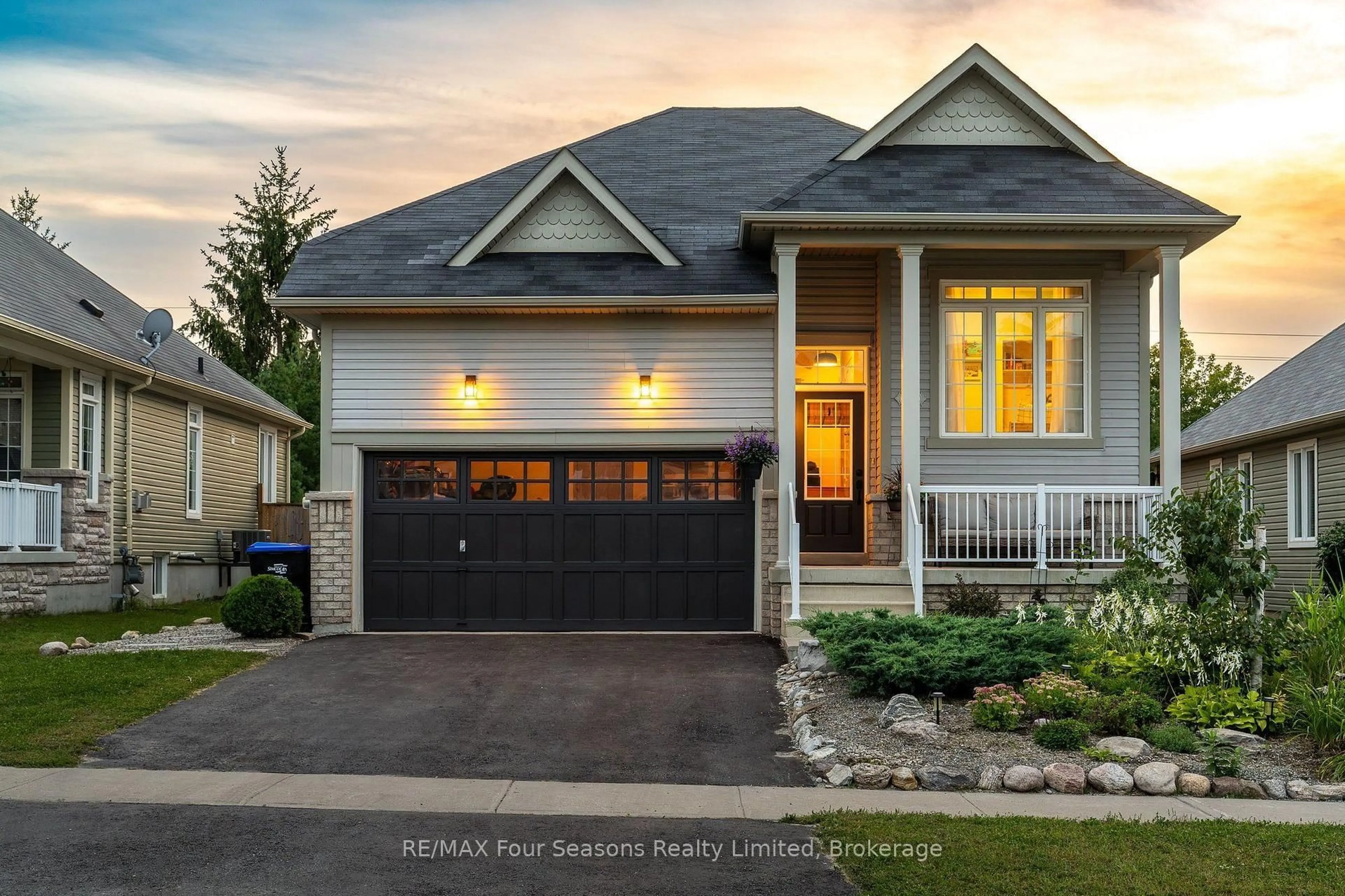 Home with brick exterior material, street for 32 Christy Dr, Wasaga Beach Ontario L9Z 1C9