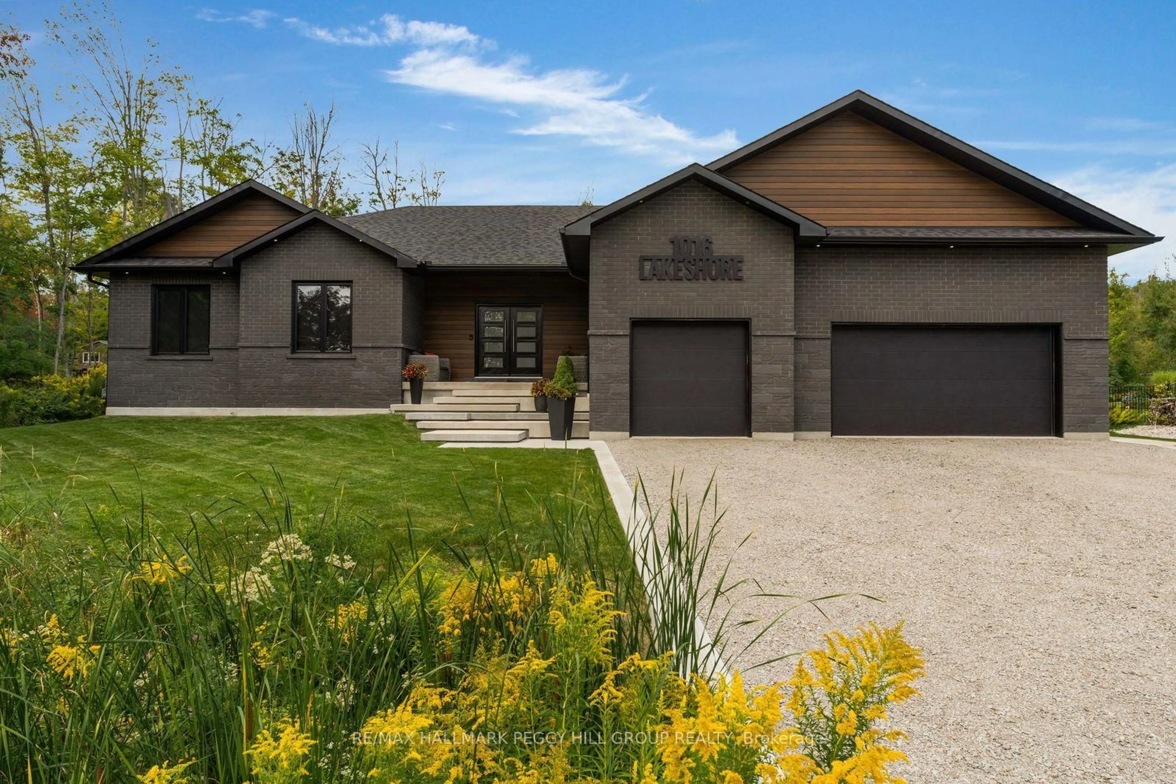 Home with vinyl exterior material, street for 1016 Lakeshore Rd, Oro-Medonte Ontario L0L 1T0