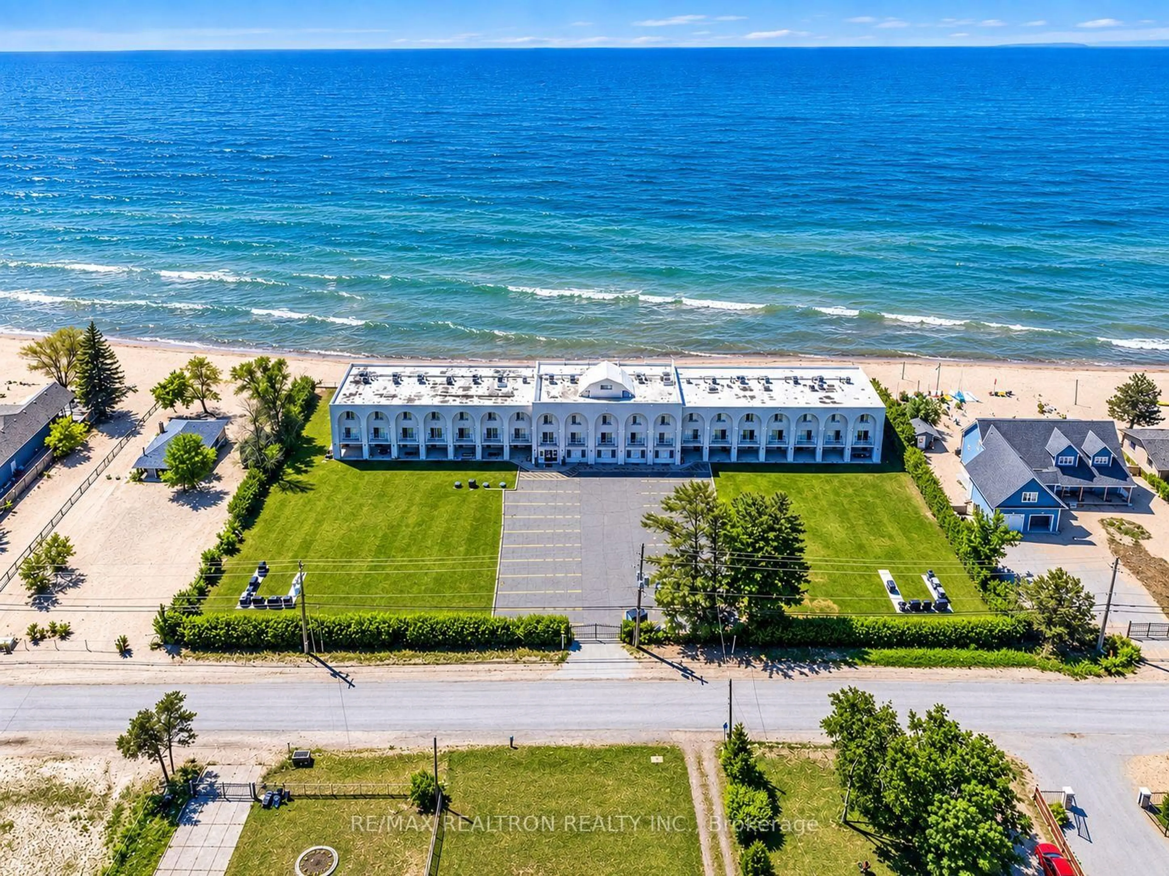 A pic from outside/outdoor area/front of a property/back of a property/a pic from drone, water/lake/river/ocean view for 1064 Tiny Beaches Rd #2, Tiny Ontario L0L 2T0