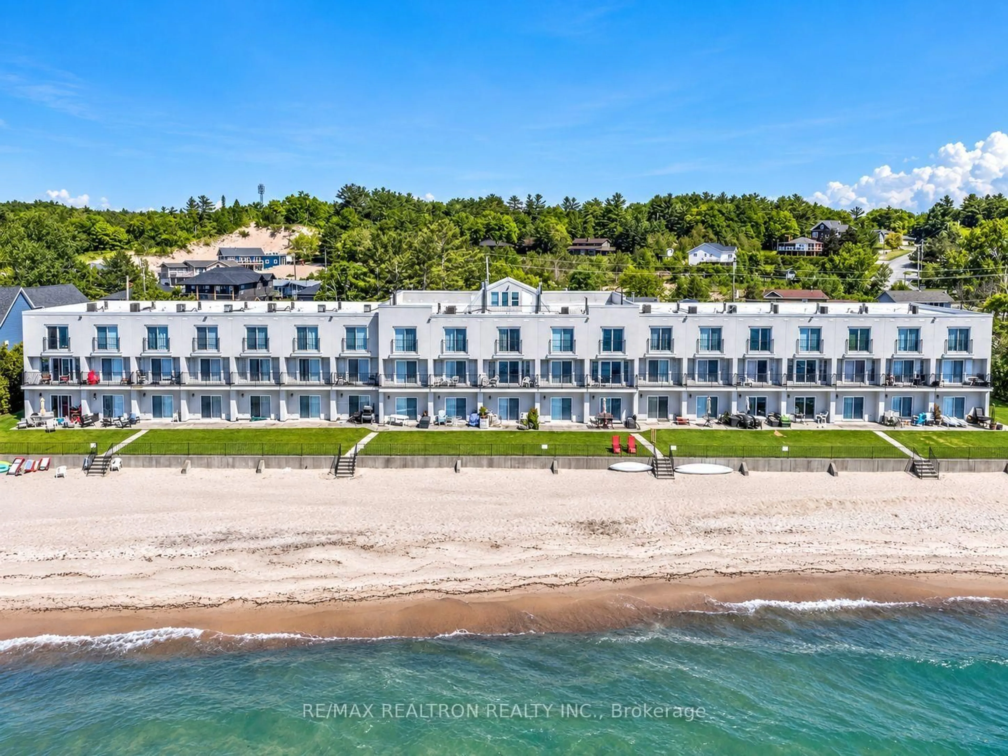 A pic from outside/outdoor area/front of a property/back of a property/a pic from drone, water/lake/river/ocean view for 1064 Tiny Beaches Rd #2, Tiny Ontario L0L 2T0