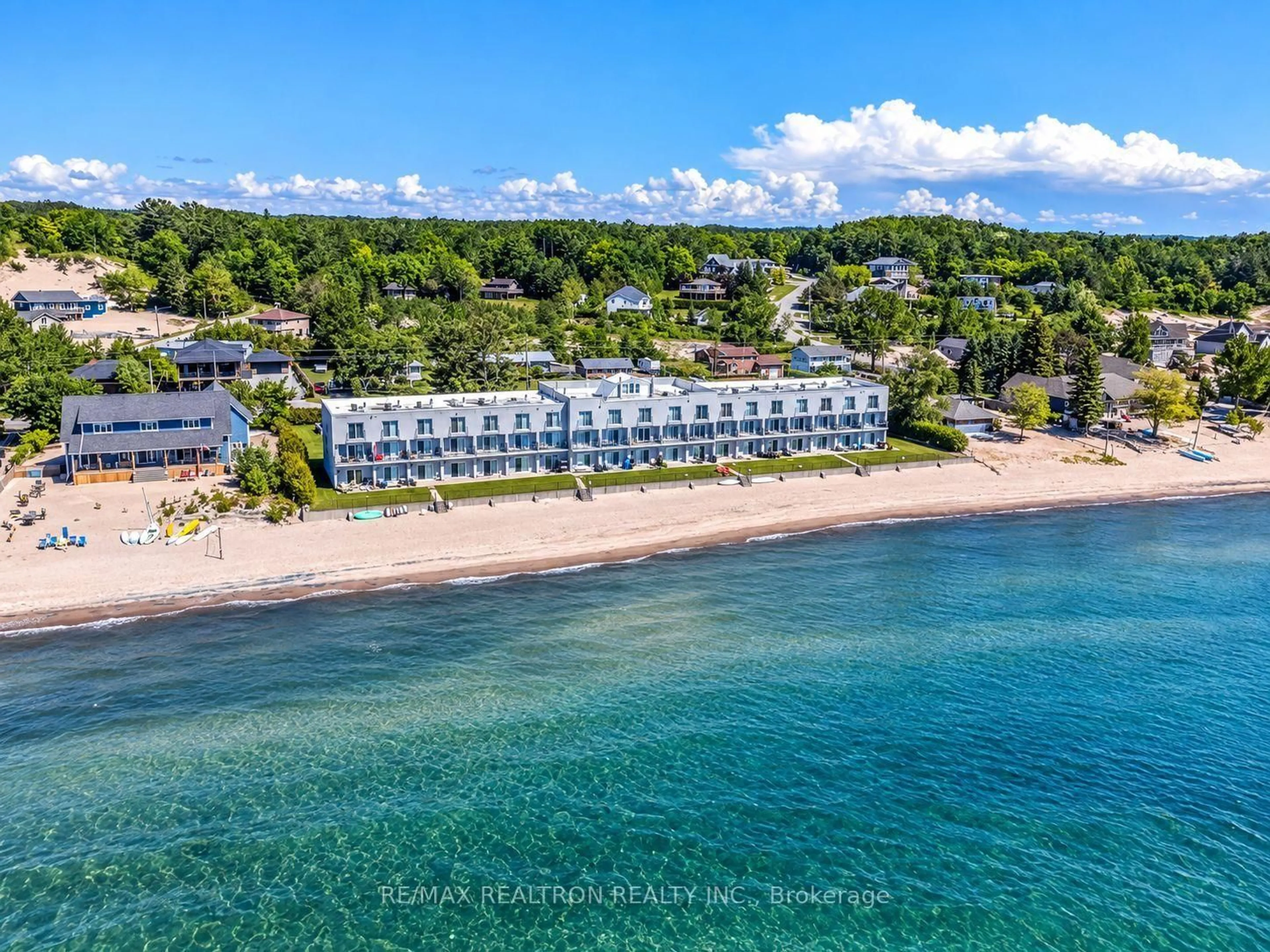 A pic from outside/outdoor area/front of a property/back of a property/a pic from drone, water/lake/river/ocean view for 1064 Tiny Beaches Rd #2, Tiny Ontario L0L 2T0