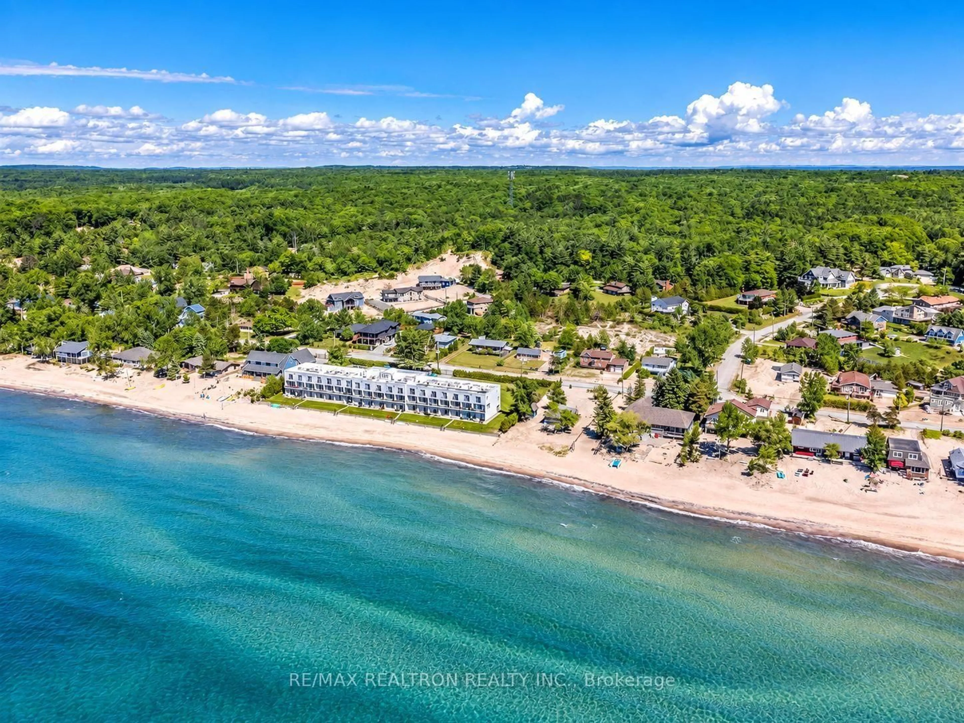 A pic from outside/outdoor area/front of a property/back of a property/a pic from drone, water/lake/river/ocean view for 1064 Tiny Beaches Rd #2, Tiny Ontario L0L 2T0