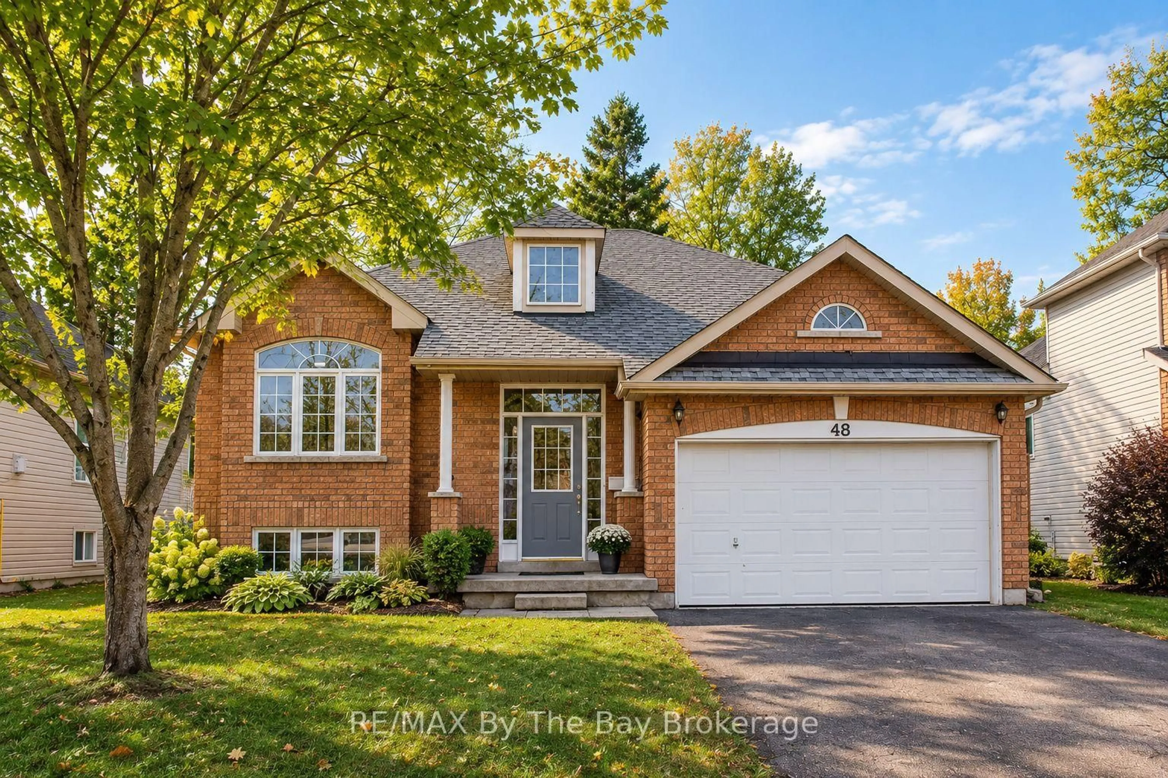 Home with brick exterior material, street for 48 Rose Valley Way, Wasaga Beach Ontario L9Z 3C4