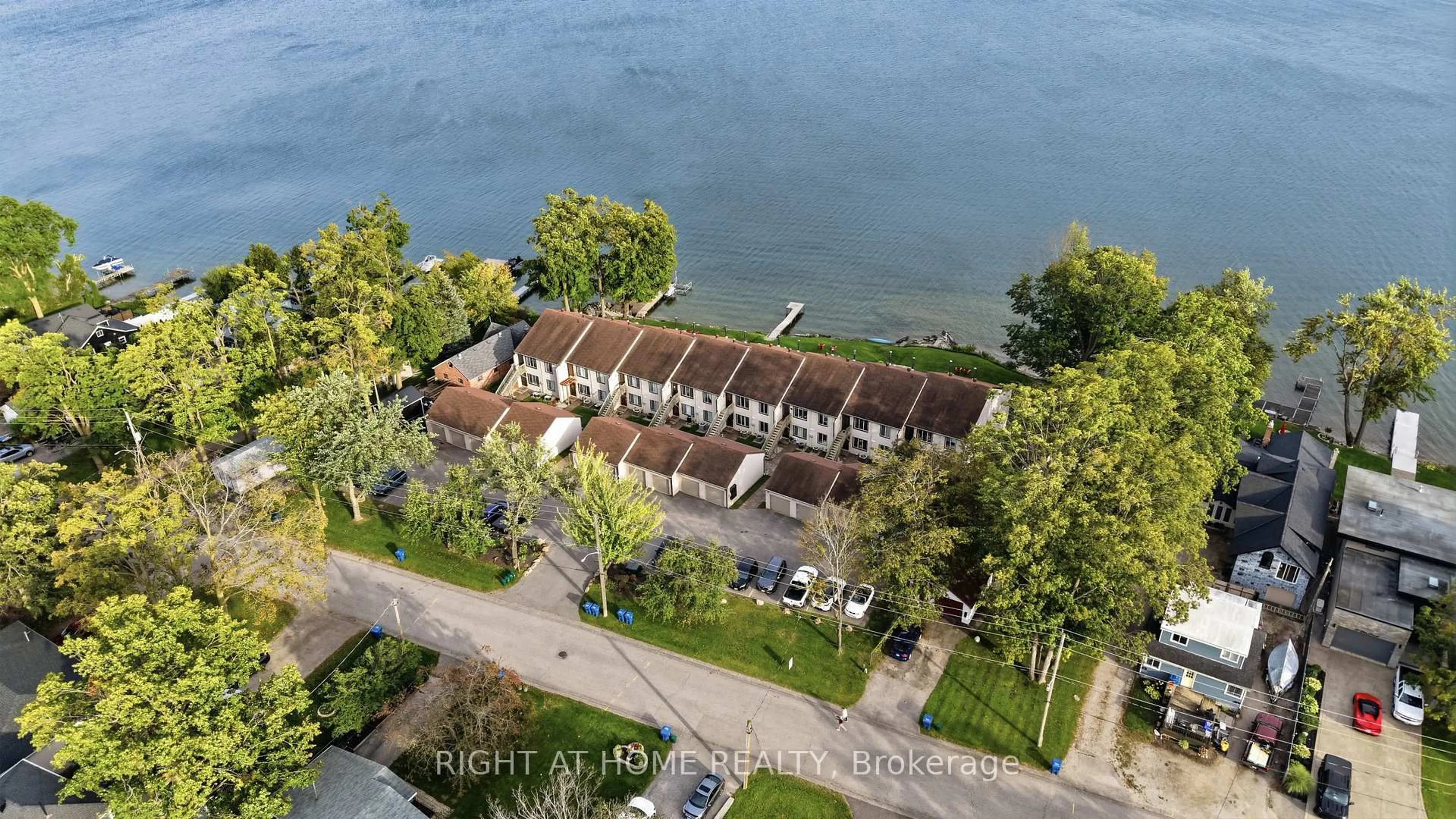 A pic from outside/outdoor area/front of a property/back of a property/a pic from drone, water/lake/river/ocean view for 43 Olive Cres #103, Orillia Ontario L3V 7M8