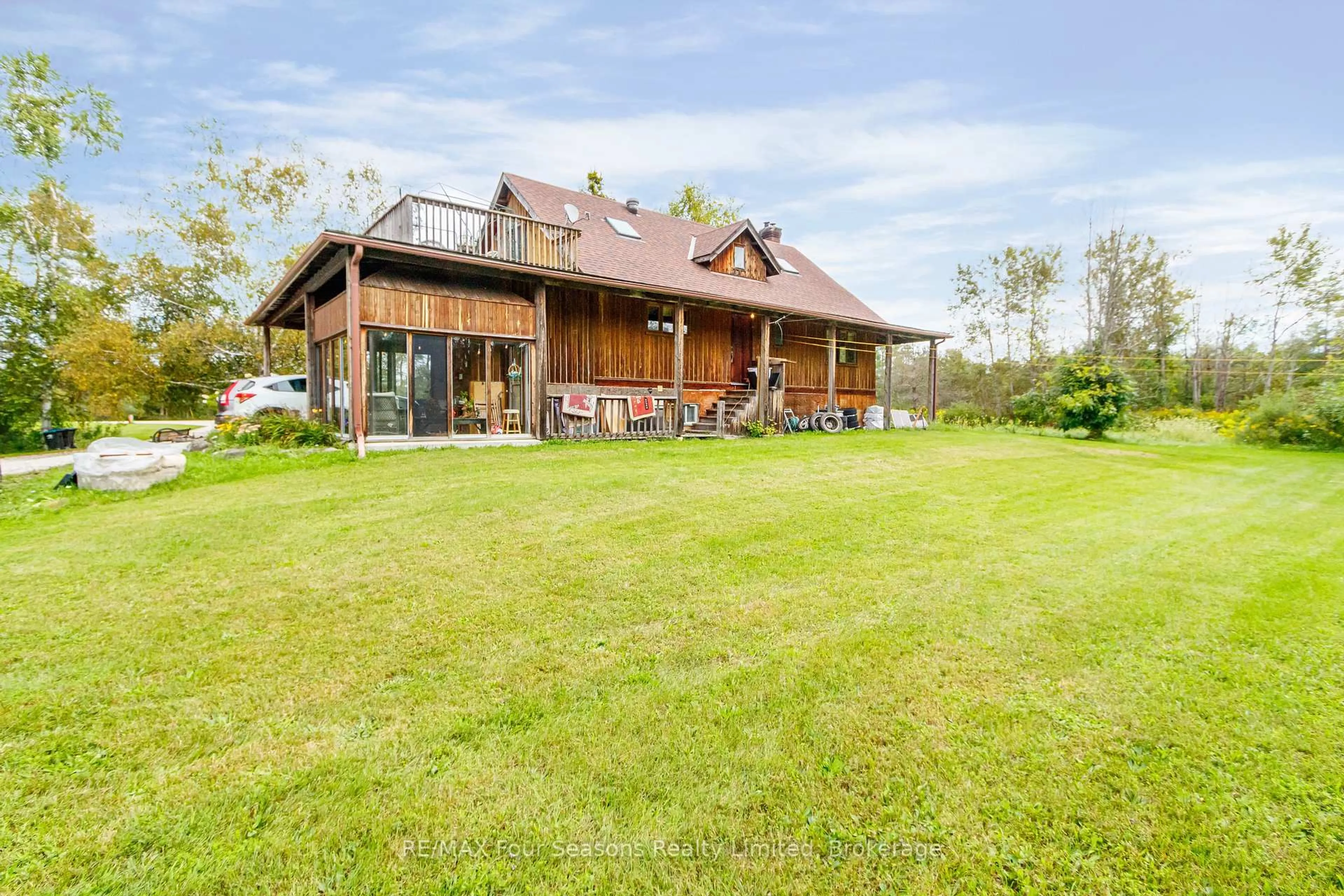 A pic from outside/outdoor area/front of a property/back of a property/a pic from drone, water/lake/river/ocean view for 1040 15/16 Sunnidale Sdrd, Clearview Ontario L0M 1S0