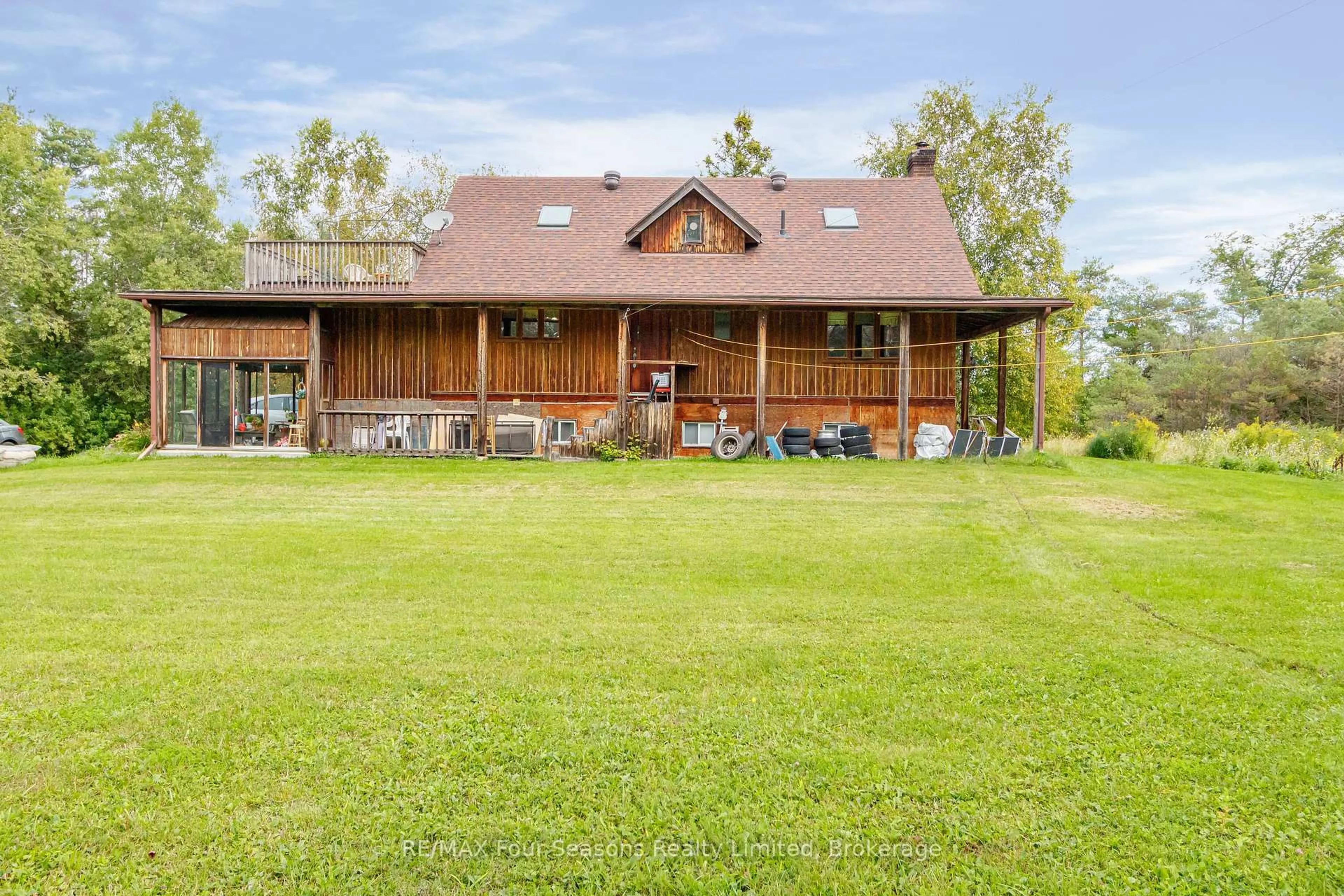 A pic from outside/outdoor area/front of a property/back of a property/a pic from drone, unknown for 1040 15/16 Sunnidale Sdrd, Clearview Ontario L0M 1S0