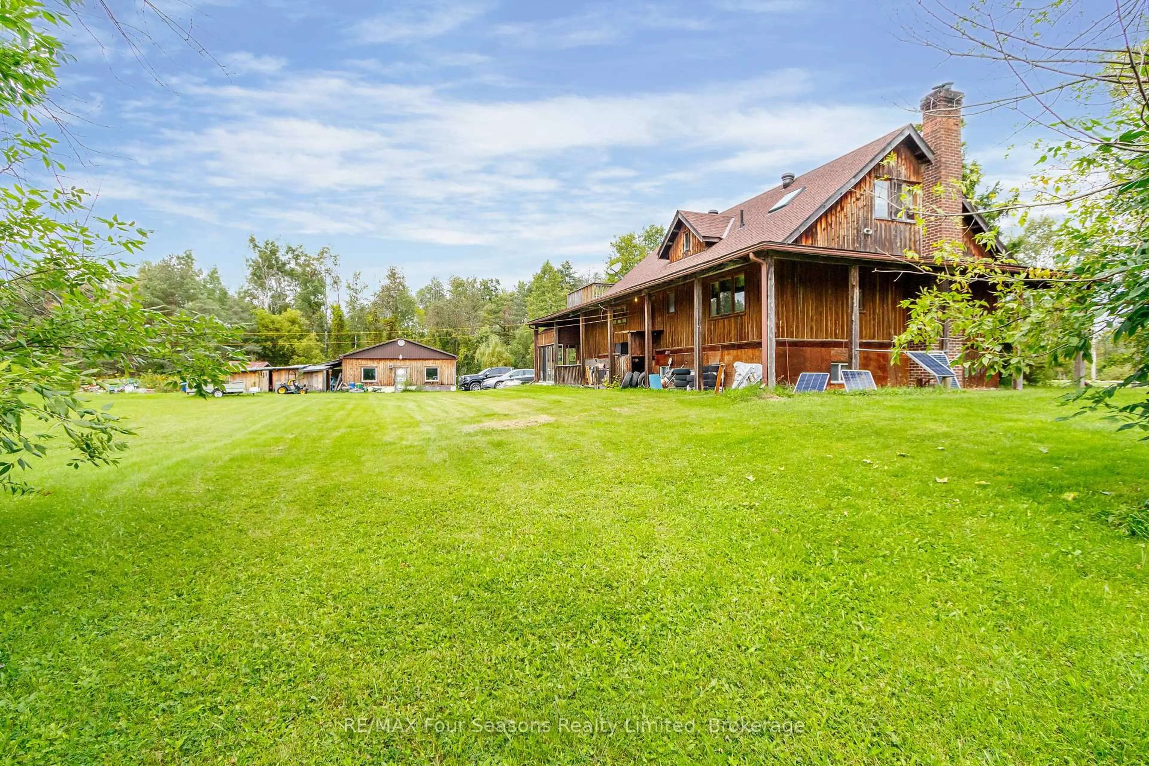A pic from outside/outdoor area/front of a property/back of a property/a pic from drone, unknown for 1040 15/16 Sunnidale Sdrd, Clearview Ontario L0M 1S0
