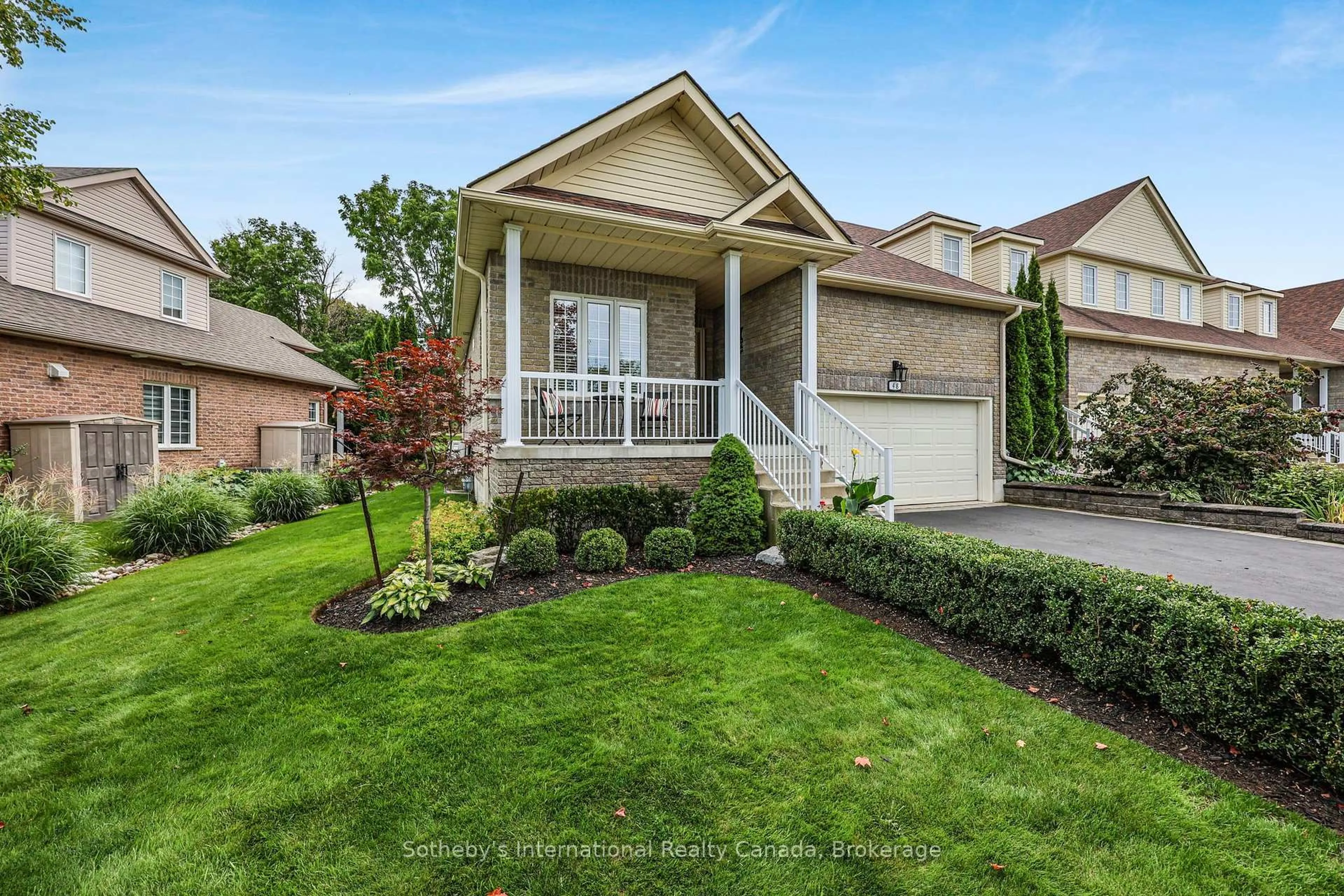 Home with brick exterior material, street for 48 Thomas Dr, Collingwood Ontario L9Y 0A6