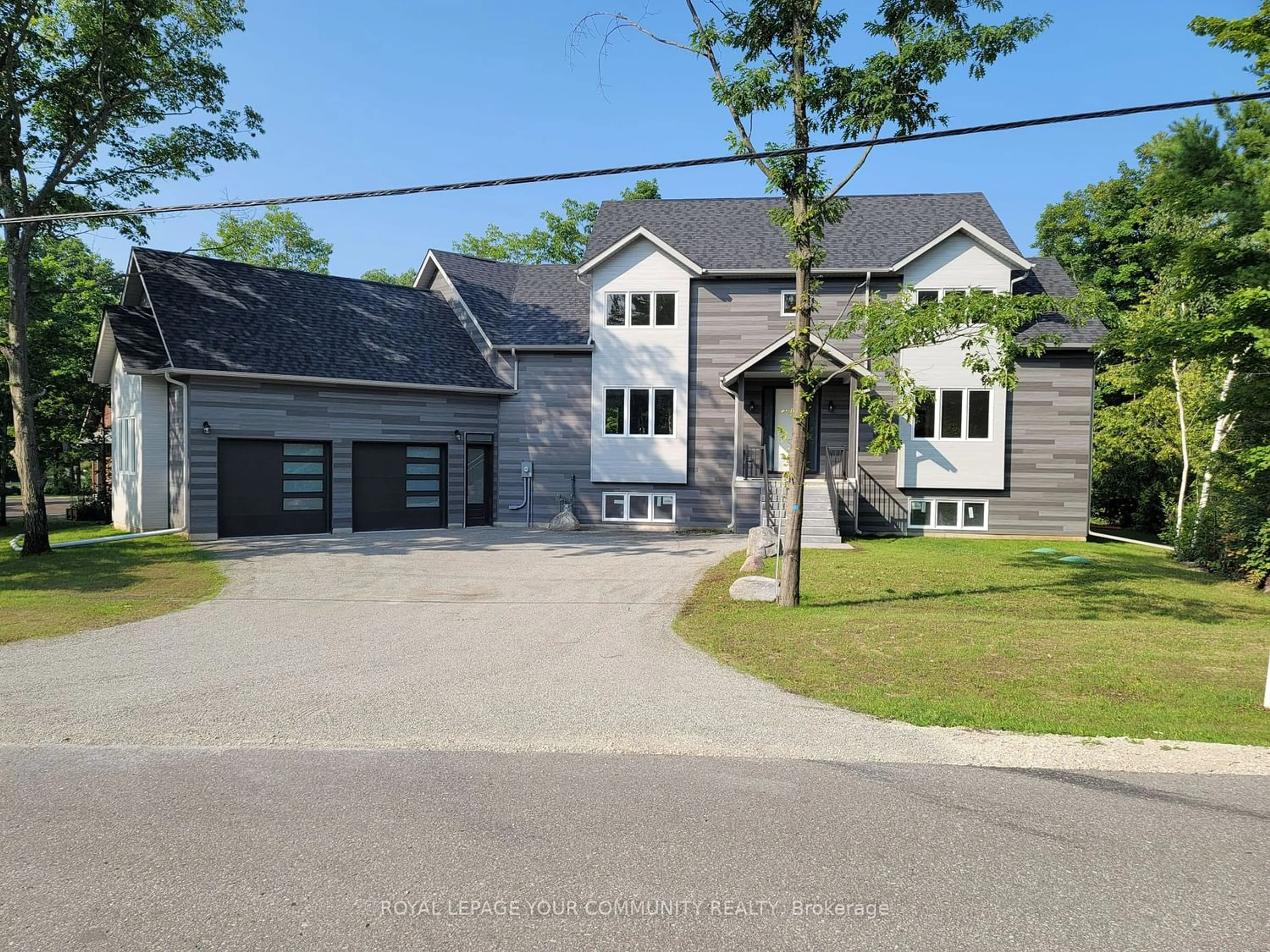 Frontside or backside of a home for 1756 Tiny Beaches Rd, Tiny Ontario L9M 0H2