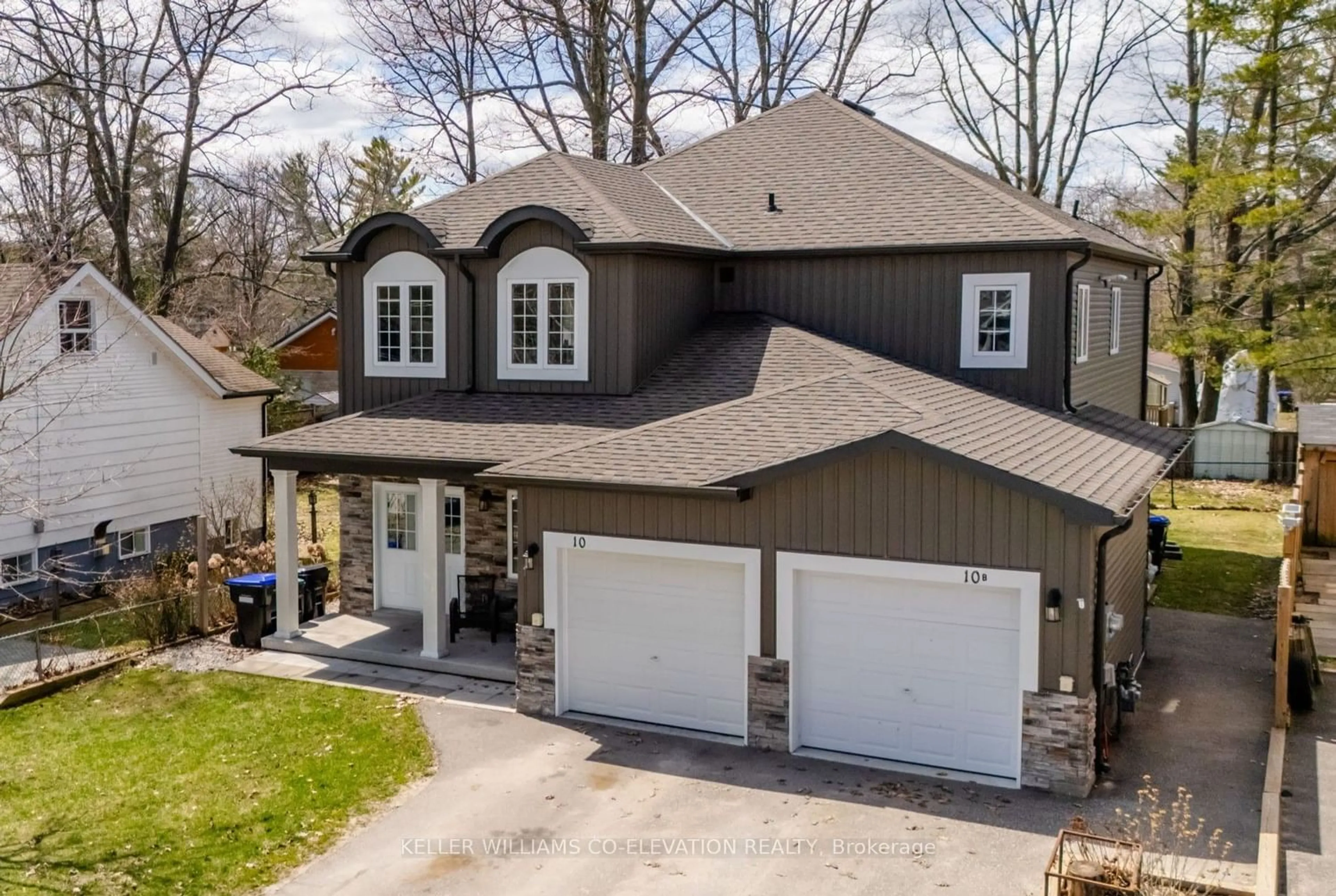 Frontside or backside of a home for 10 Elm Dr, Wasaga Beach Ontario L9Z 2L3