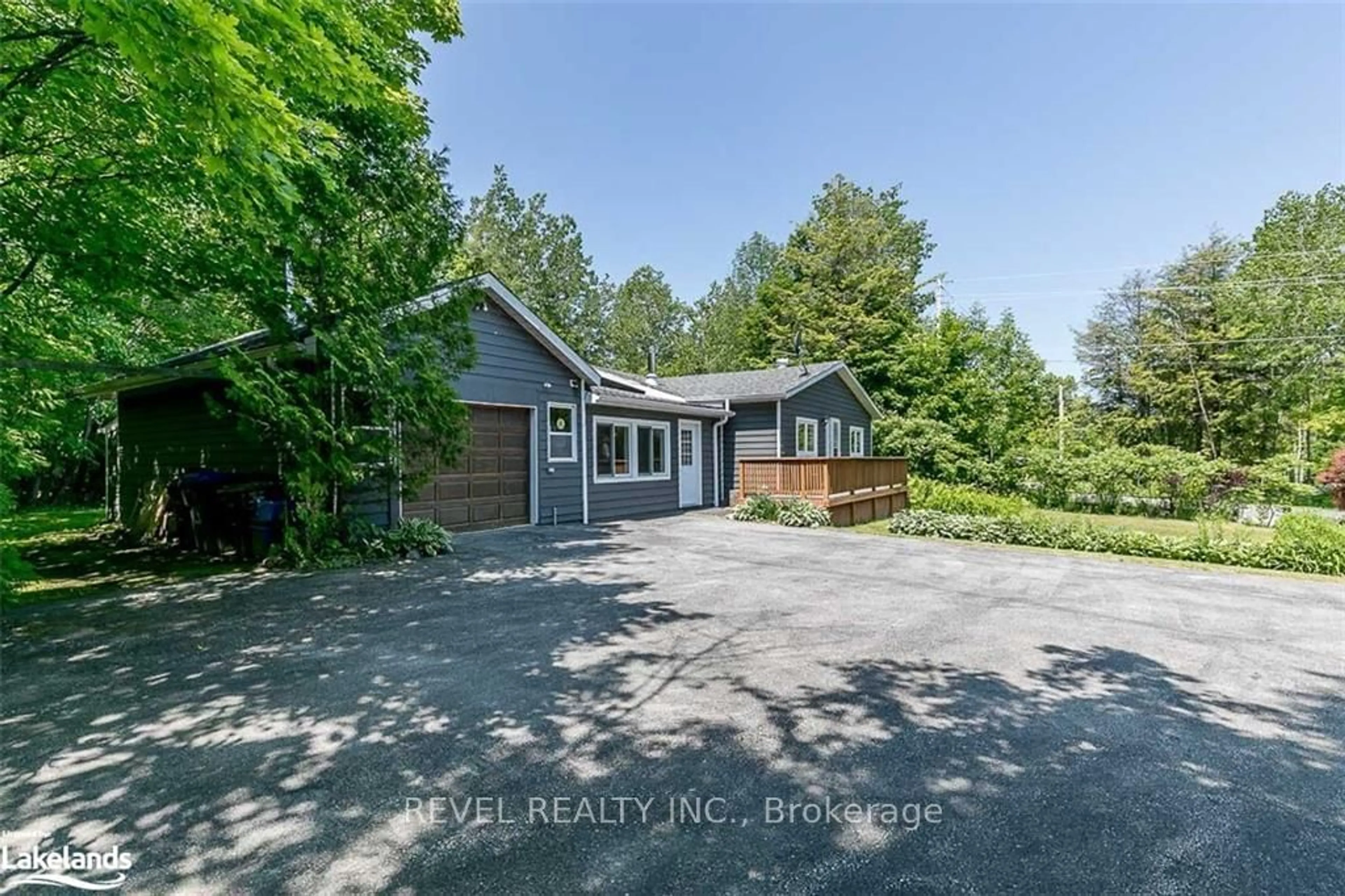 Frontside or backside of a home for 2440 Champlain Rd, Tiny Ontario L9M 0C9