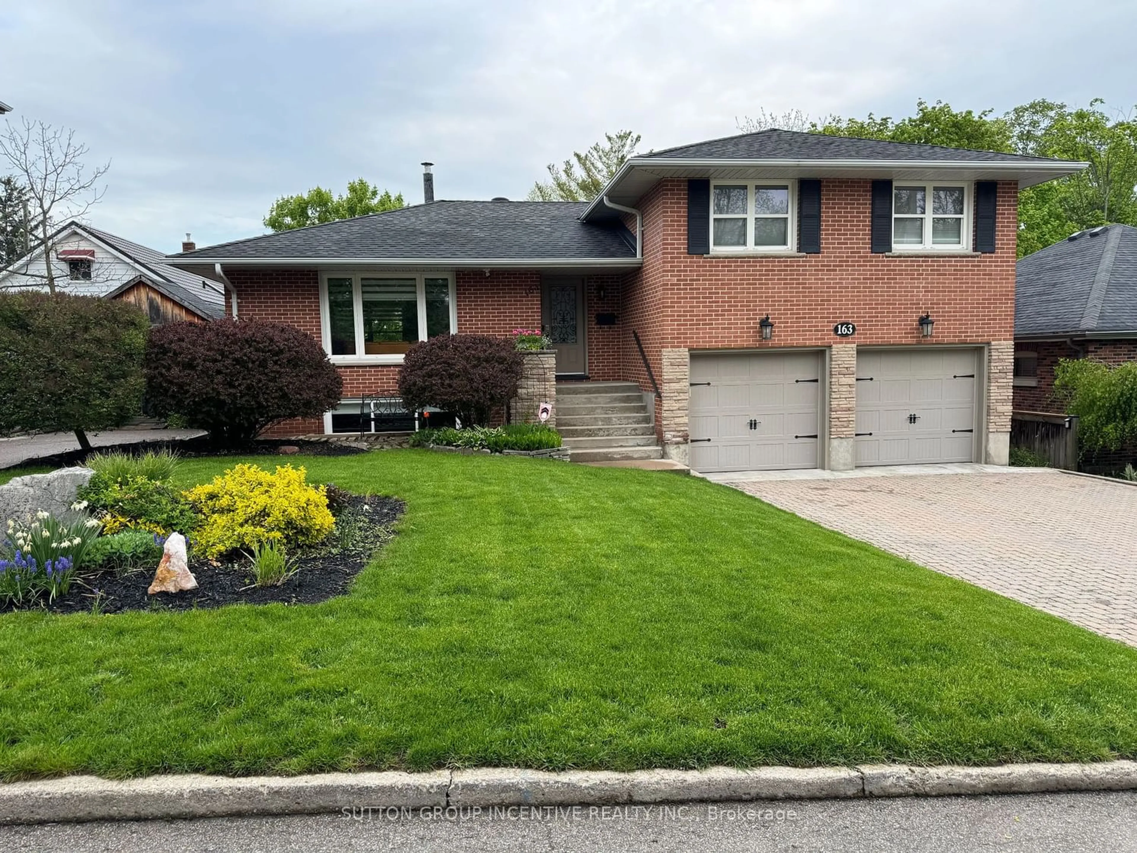 Home with brick exterior material for 163 Clapperton St, Barrie Ontario L4M 3G5