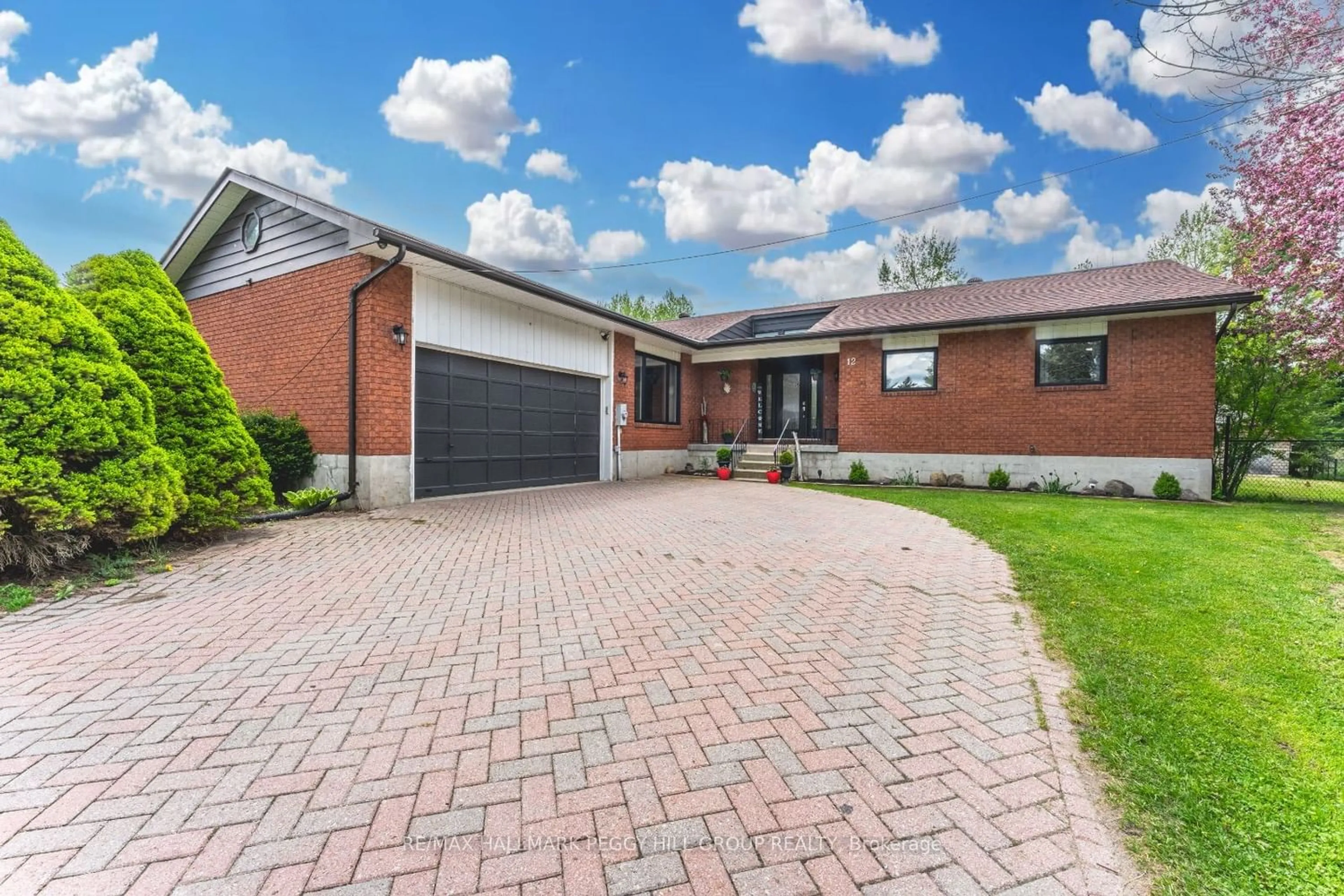 Home with brick exterior material for 12 Marni Lane, Springwater Ontario L0L 2K0