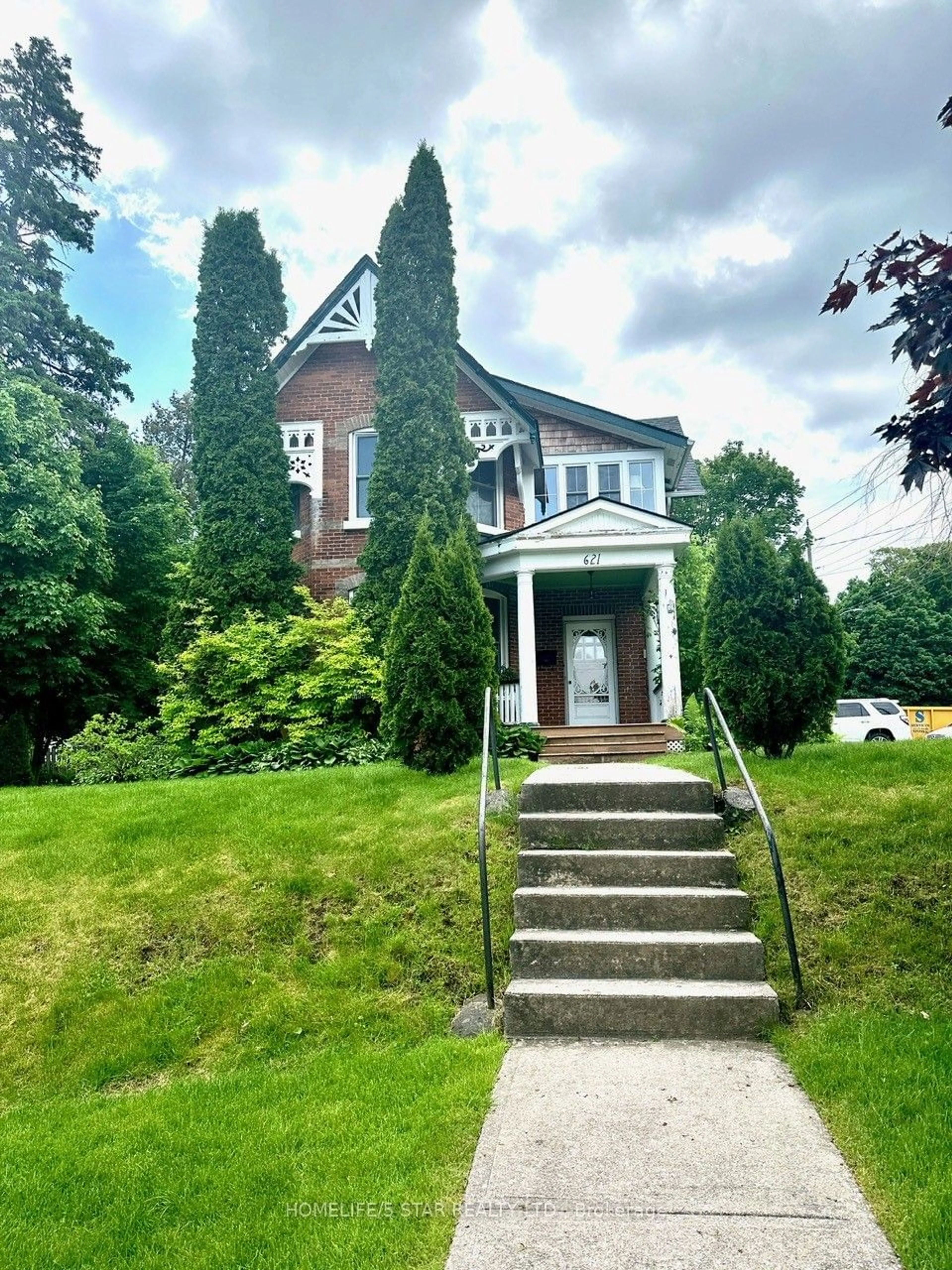 Frontside or backside of a home for 621 HUGEL Ave, Midland Ontario L4R 1W4