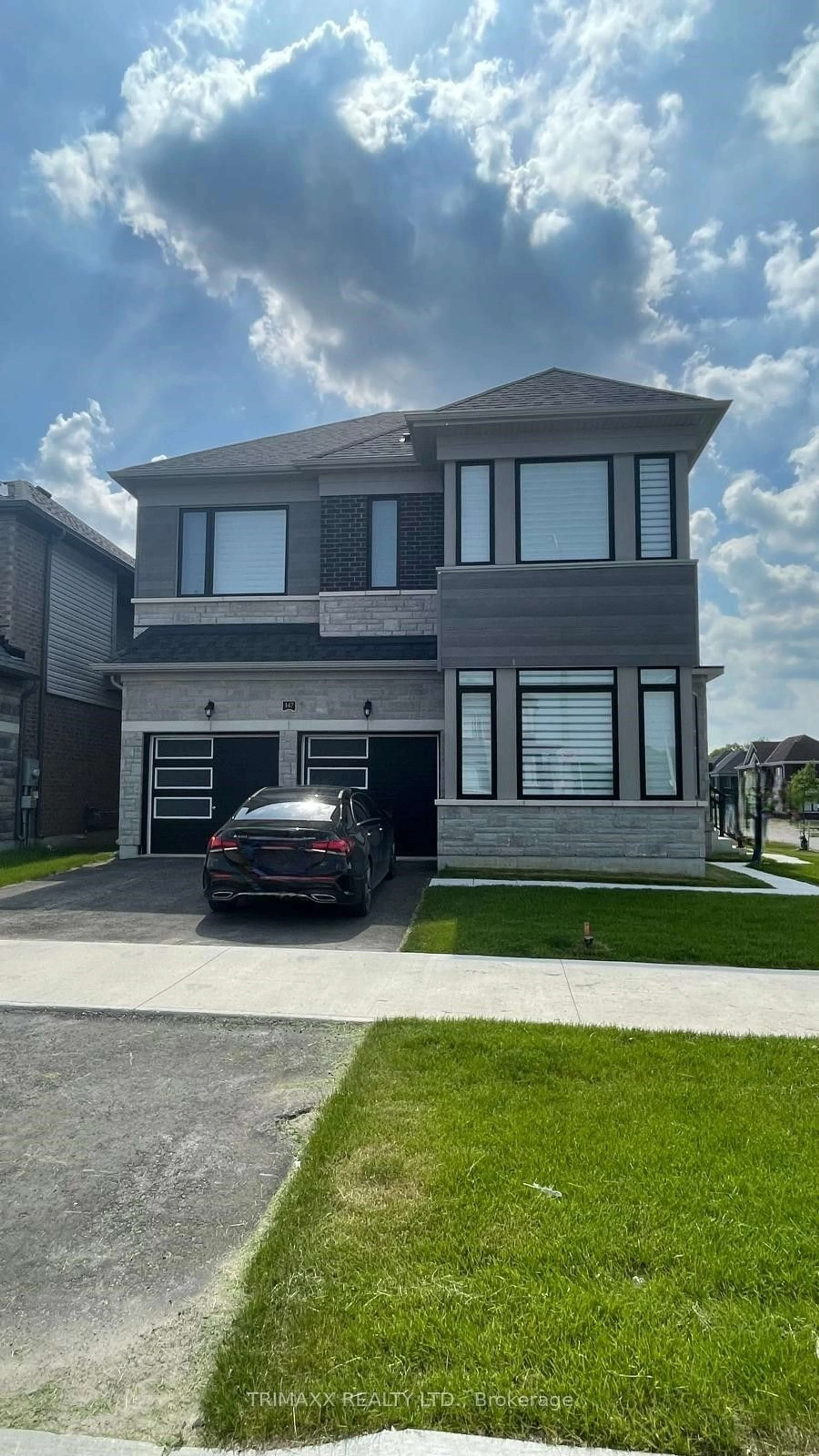 Frontside or backside of a home for 147 Terry Fox Dr, Barrie Ontario L9S 2Z8