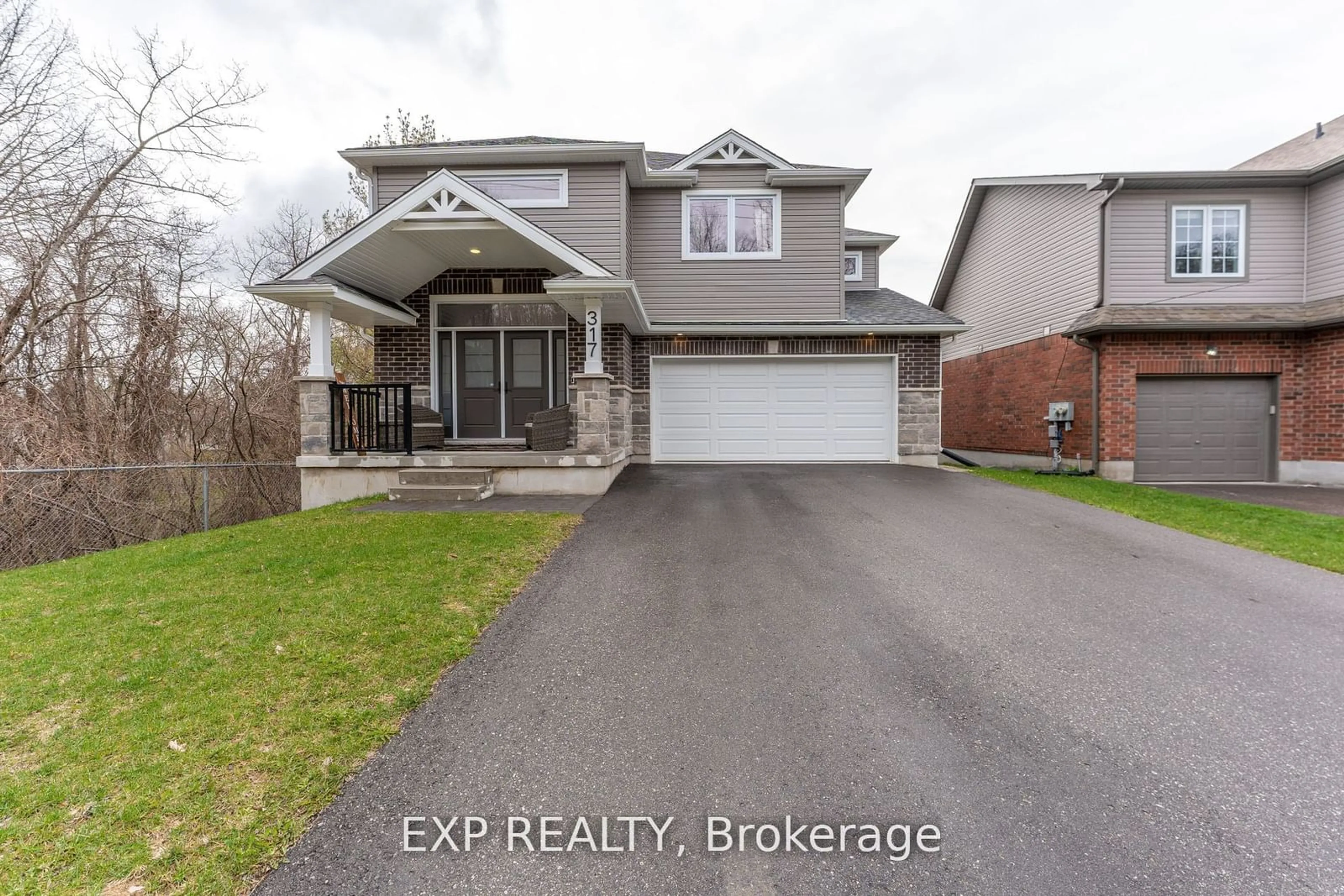 Frontside or backside of a home for 317 Edgehill Dr, Barrie Ontario L4N 9X5