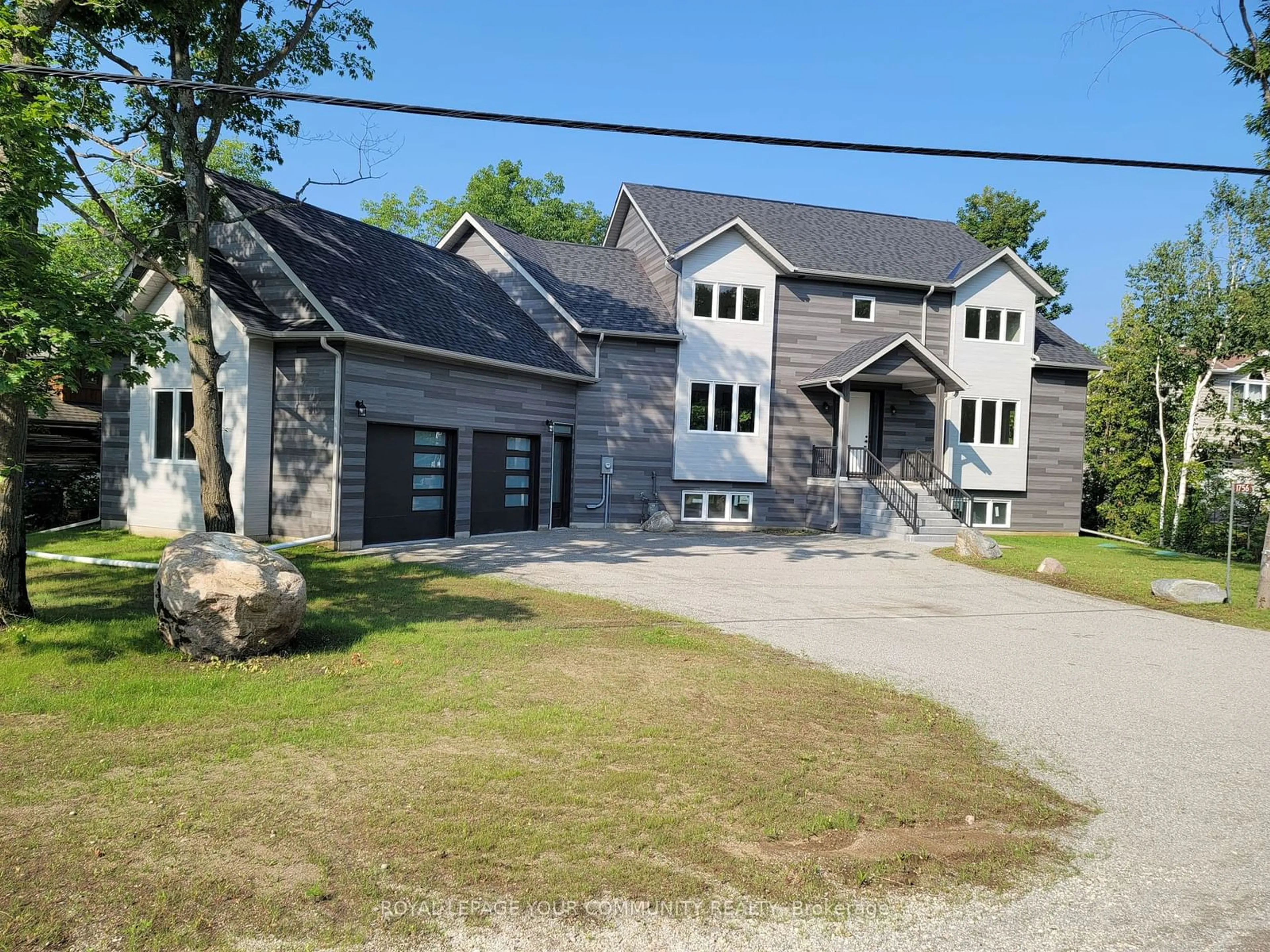 Frontside or backside of a home for 1756 Tiny Beaches Rd, Tiny Ontario L9M 0H2