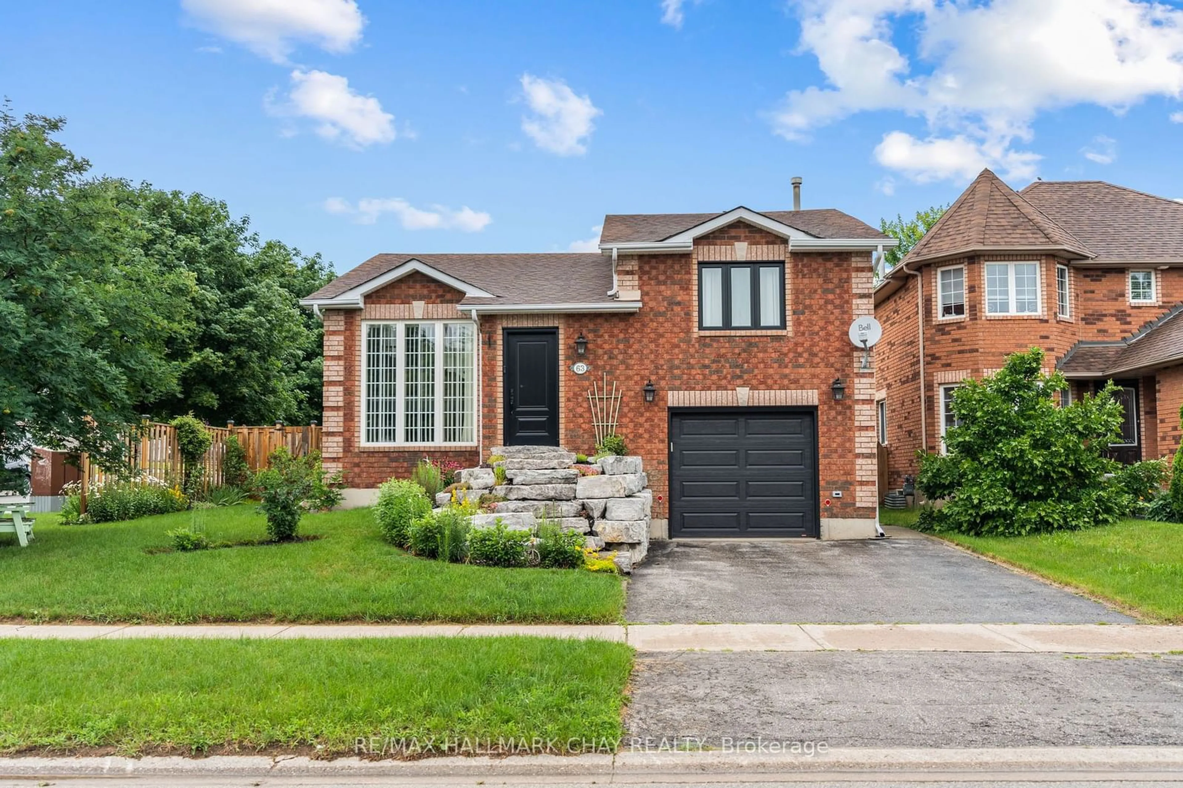 Home with brick exterior material for 63 Hersey Cres, Barrie Ontario L4N 8R2