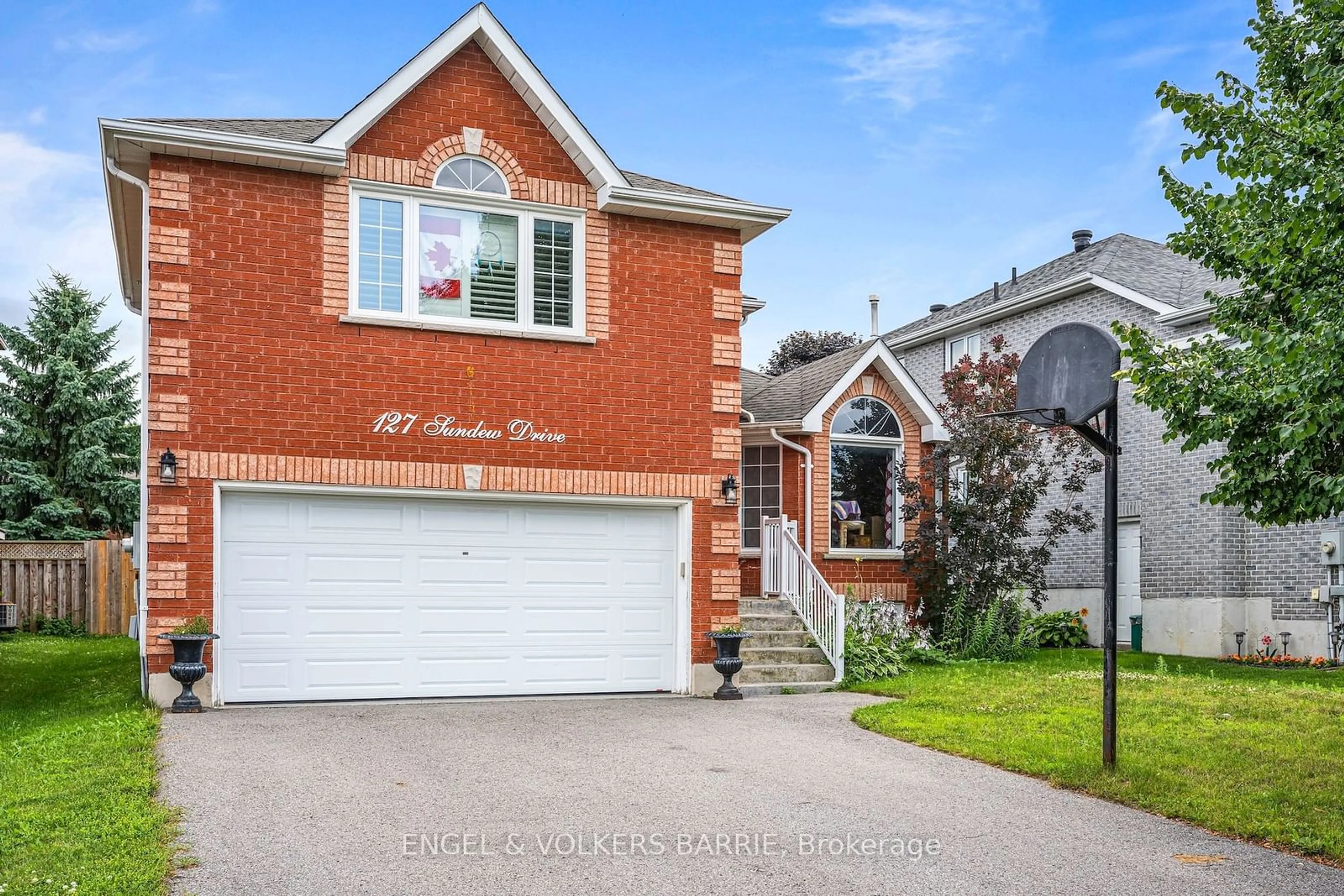 Home with brick exterior material for 127 Sundew Dr, Barrie Ontario L4N 9M2