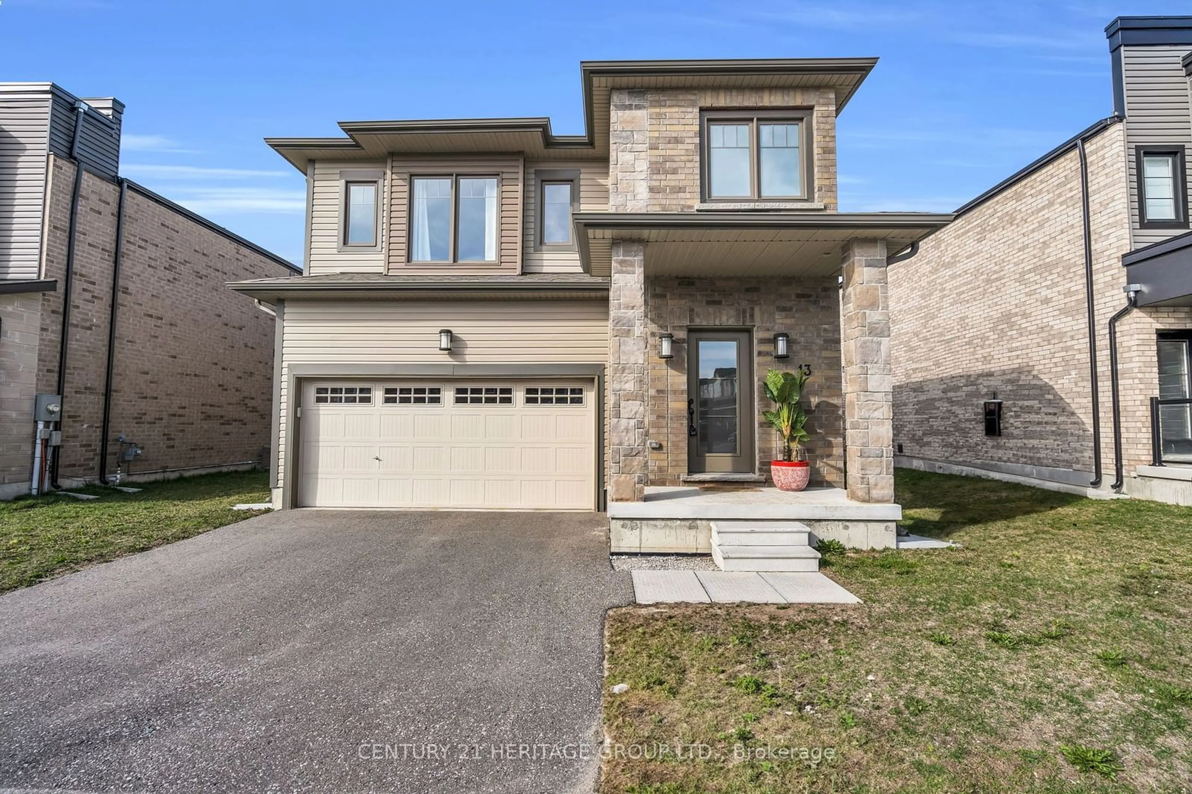 Home with brick exterior material for 13 Mabern St, Barrie Ontario L9J 0J1