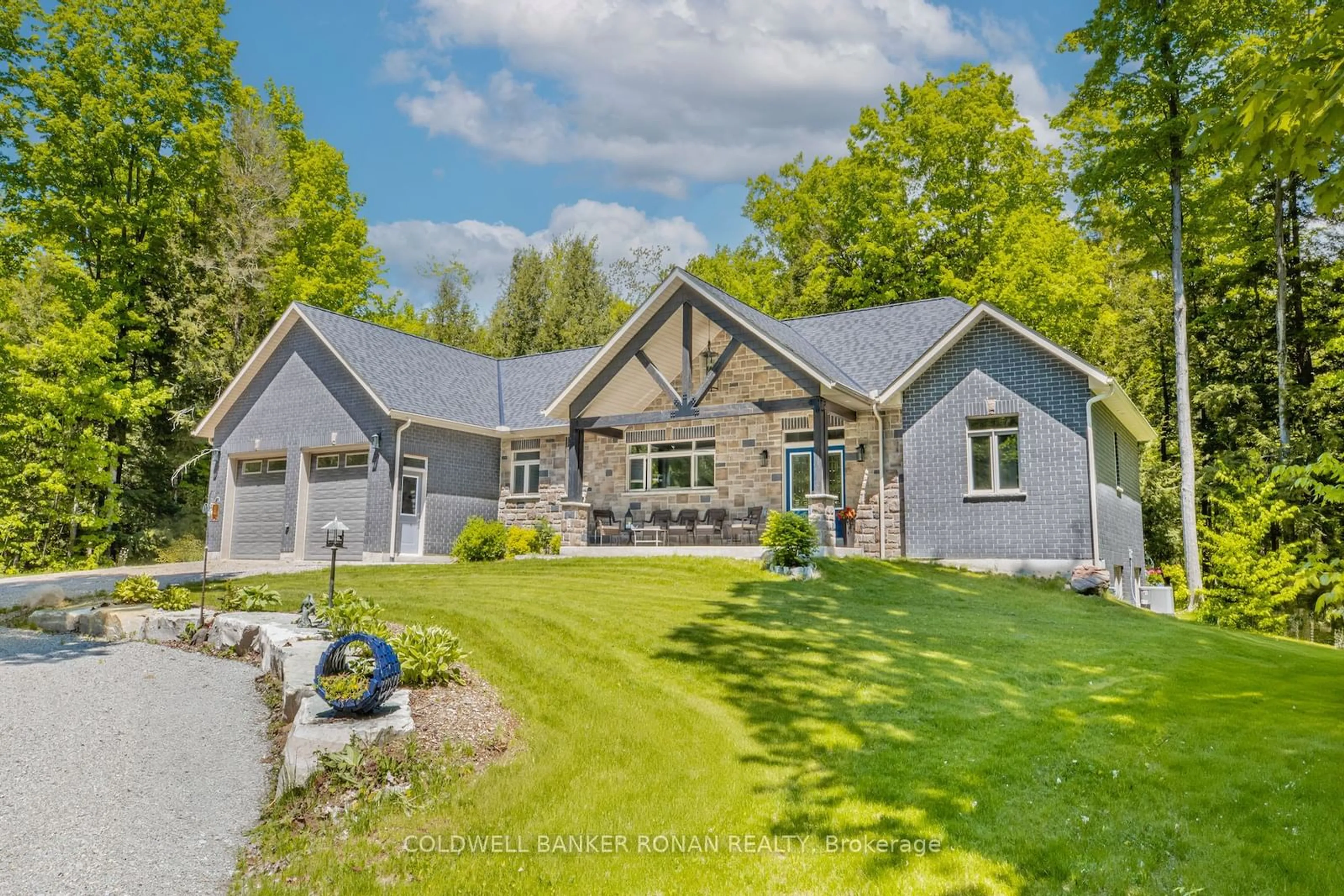 Frontside or backside of a home for 850 Tiny Beaches Rd, Tiny Ontario L9M 0M1