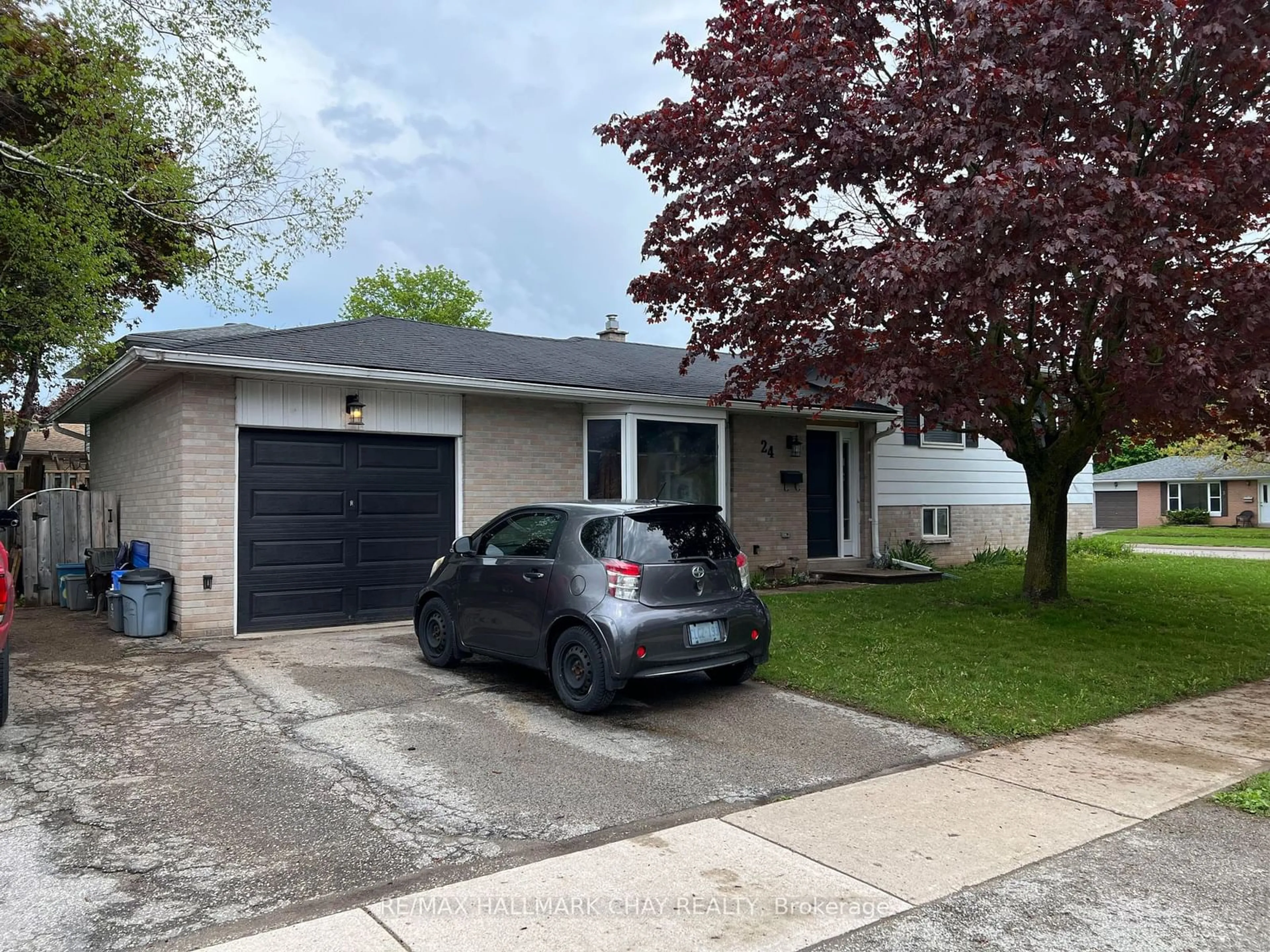 Frontside or backside of a home for 24 College Cres, Barrie Ontario L4M 2W3