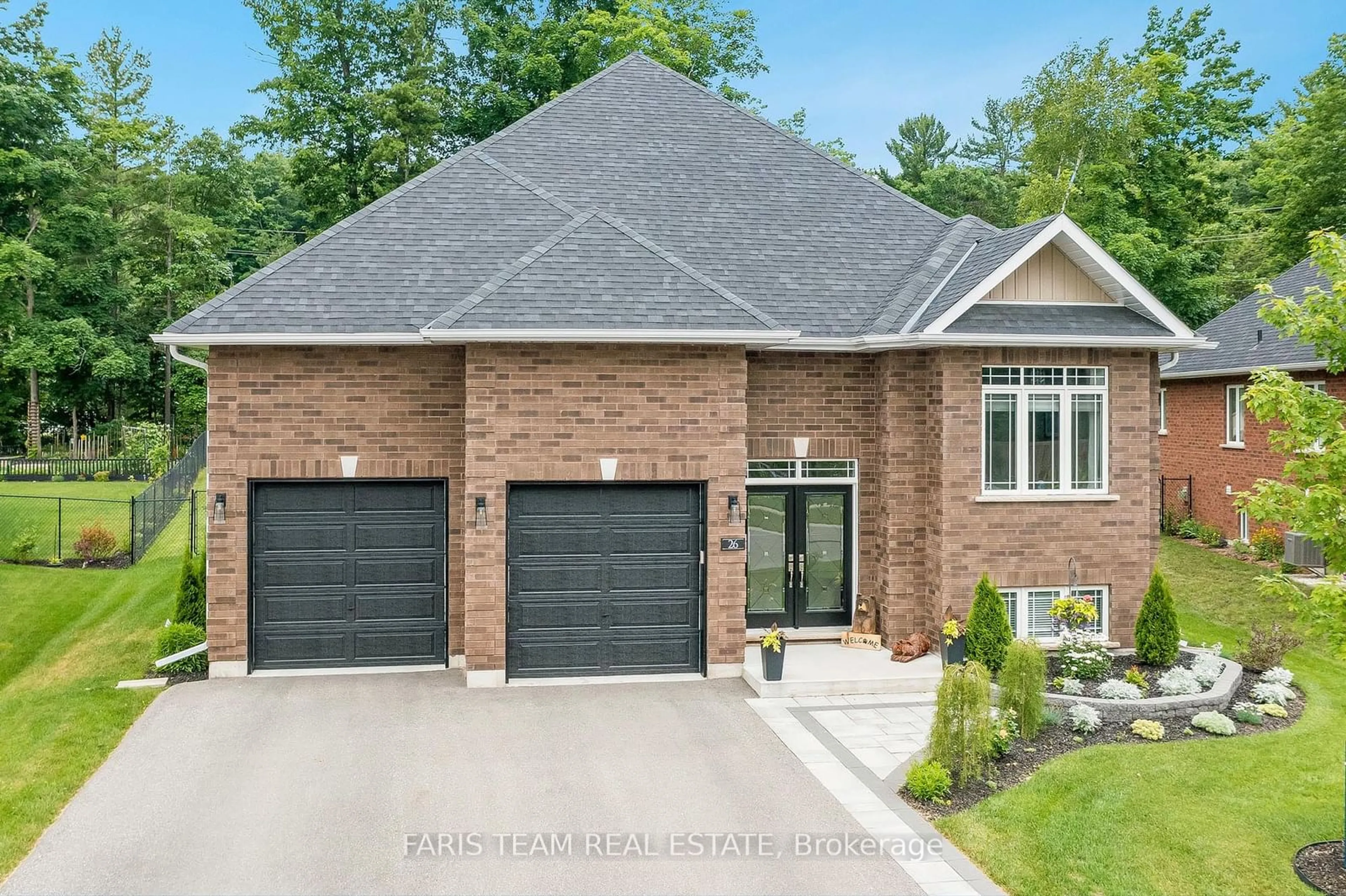 Home with brick exterior material for 26 Natures Tr, Wasaga Beach Ontario L9Z 0H4