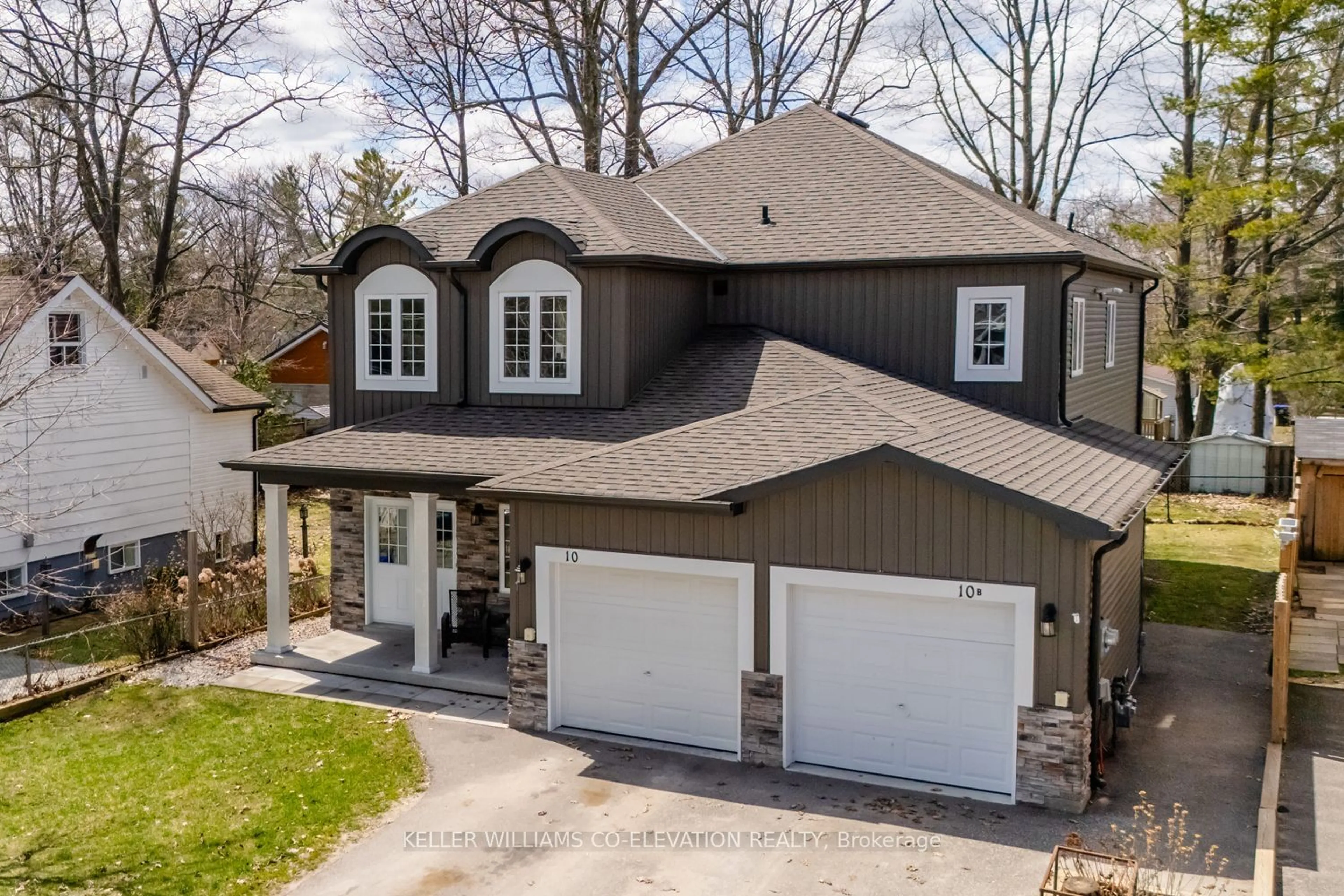 Frontside or backside of a home for 10 Elm Dr, Wasaga Beach Ontario L9Z 2L3