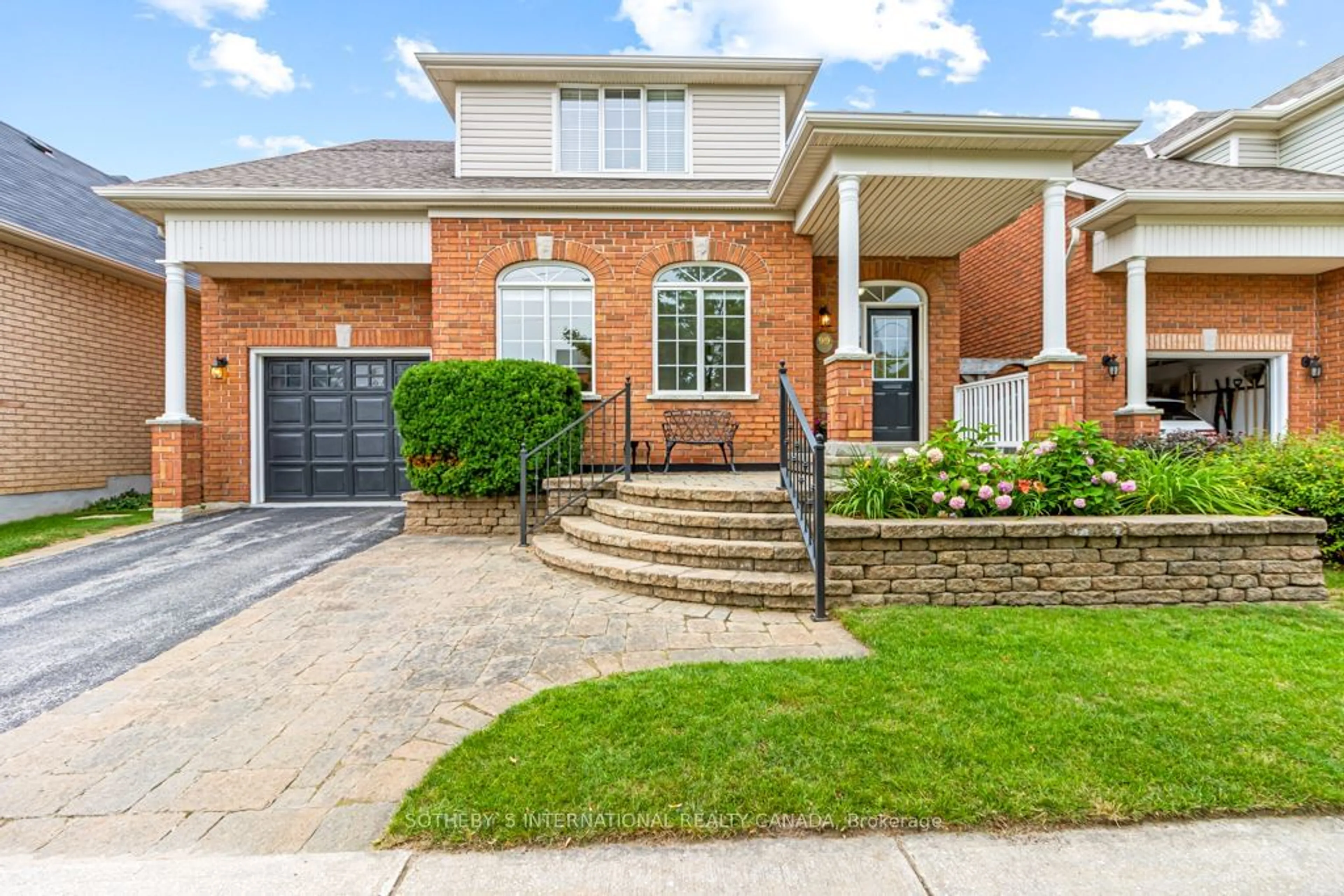 Home with brick exterior material for 99 Saint Paul St, Collingwood Ontario L9Y 3P1