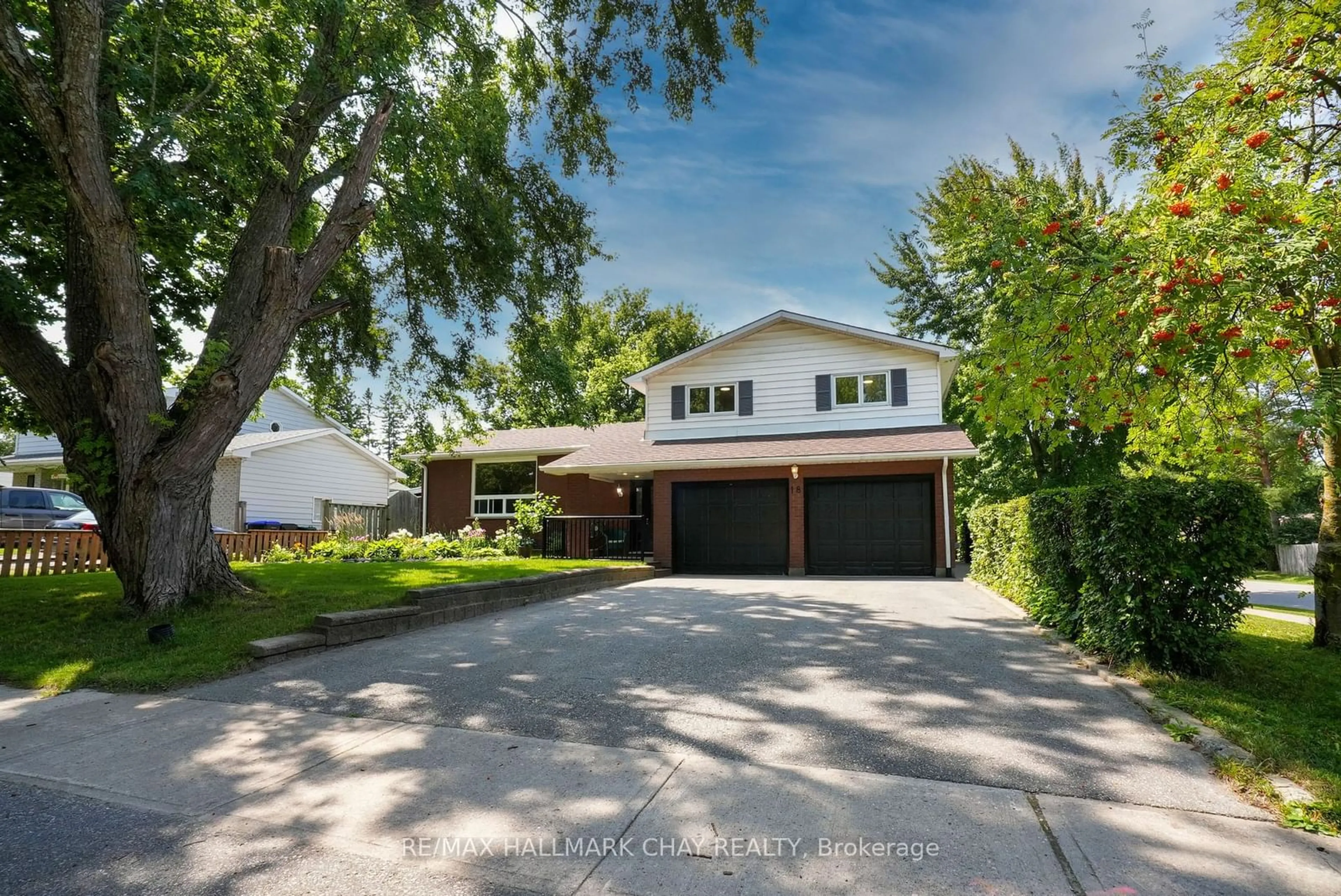 Frontside or backside of a home, the street view for 18 Centennial Ave, Springwater Ontario L0L 1P0