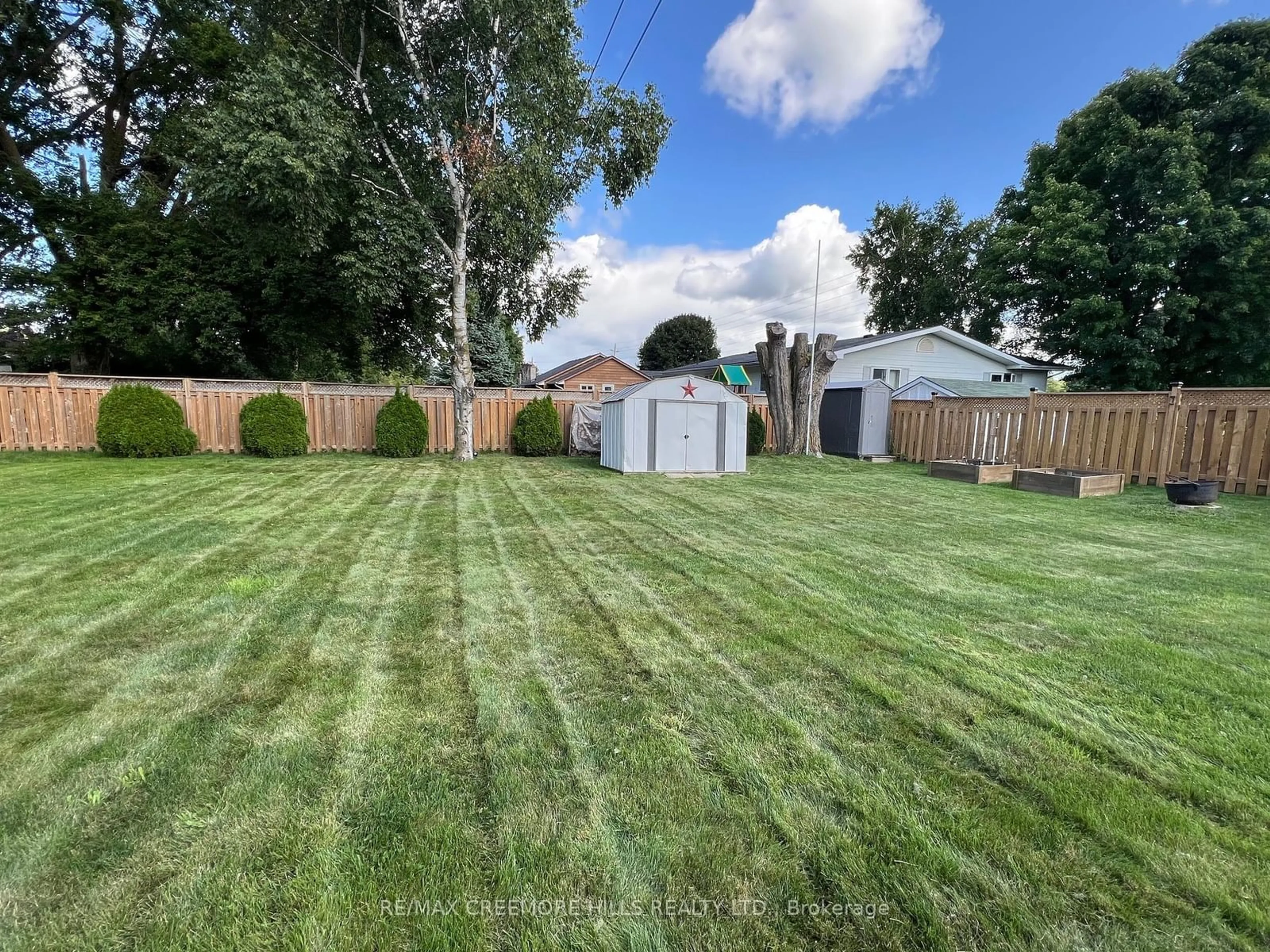 Frontside or backside of a home, the fenced backyard for 3 Jardine Cres, Clearview Ontario L0M 1G0