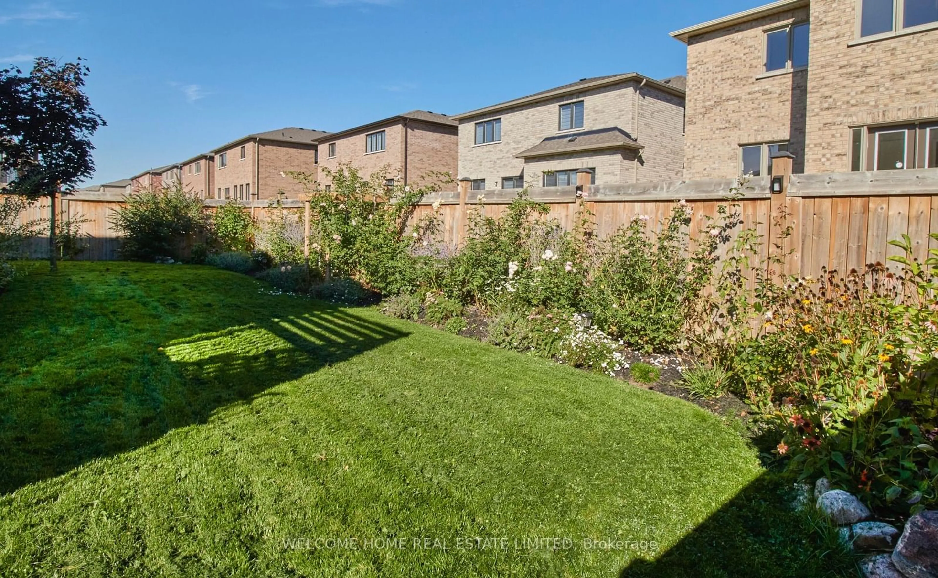 A pic from exterior of the house or condo, the fenced backyard for 233 Centre St, Clearview Ontario L0M 1S0