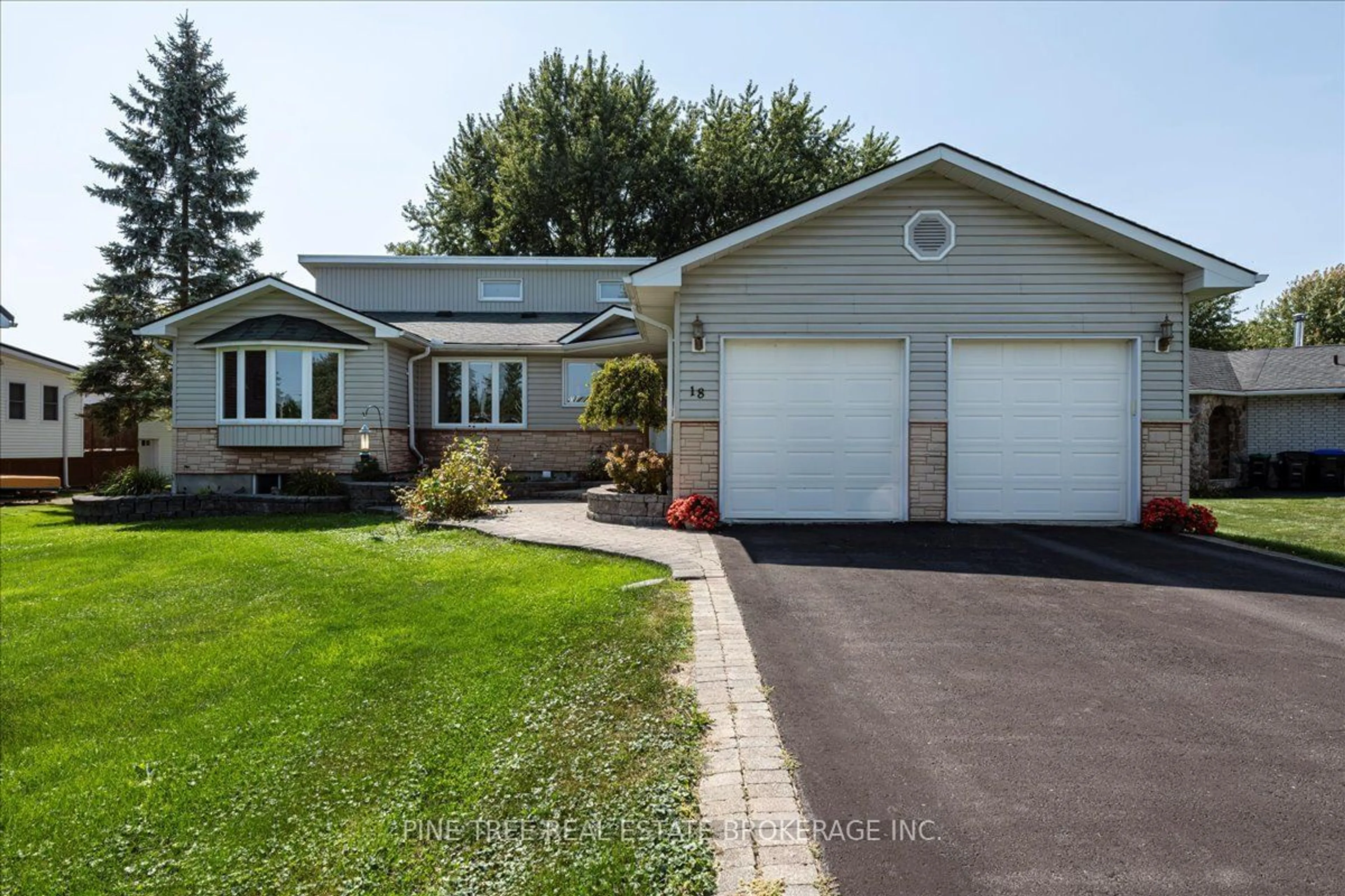 Frontside or backside of a home, the street view for 18 Turtle Path, Ramara Ontario L0K 1B0