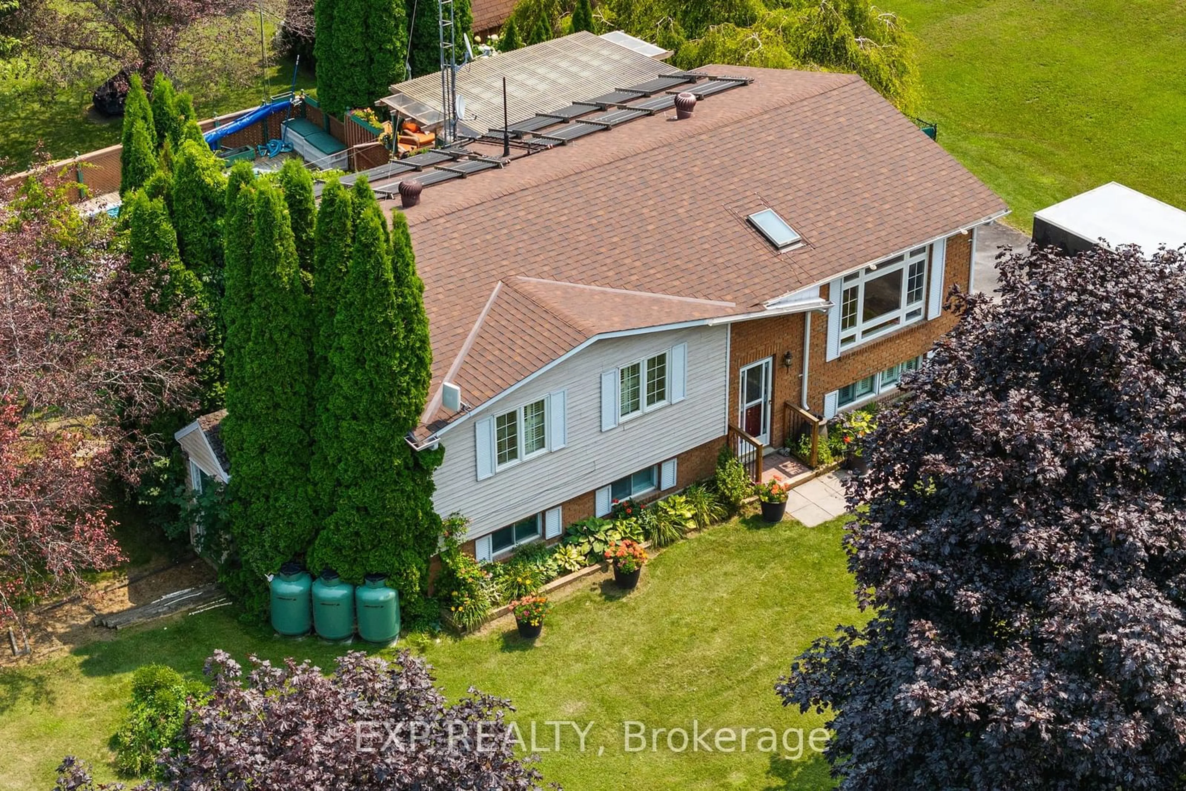 Frontside or backside of a home, the fenced backyard for 2948 Suntrac Dr, Ramara Ontario L0K 1B0